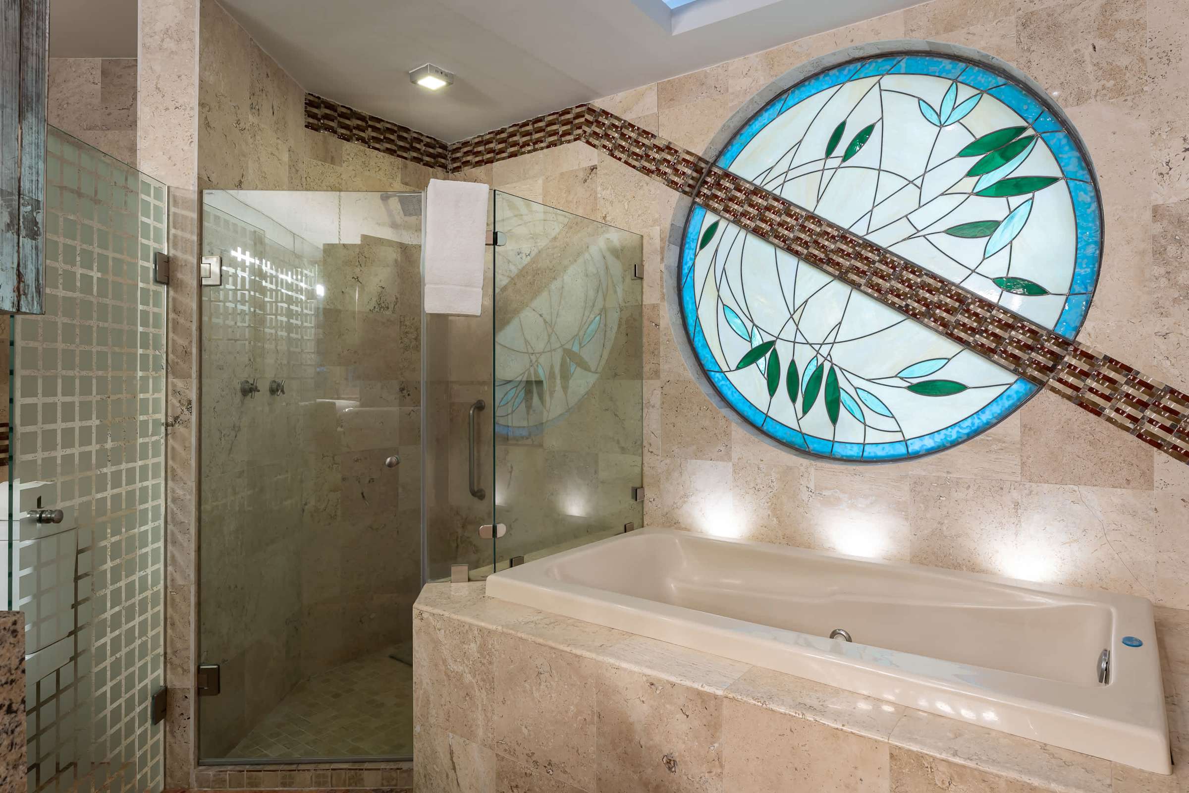 Primary ensuite with soaking tub and walk in shower