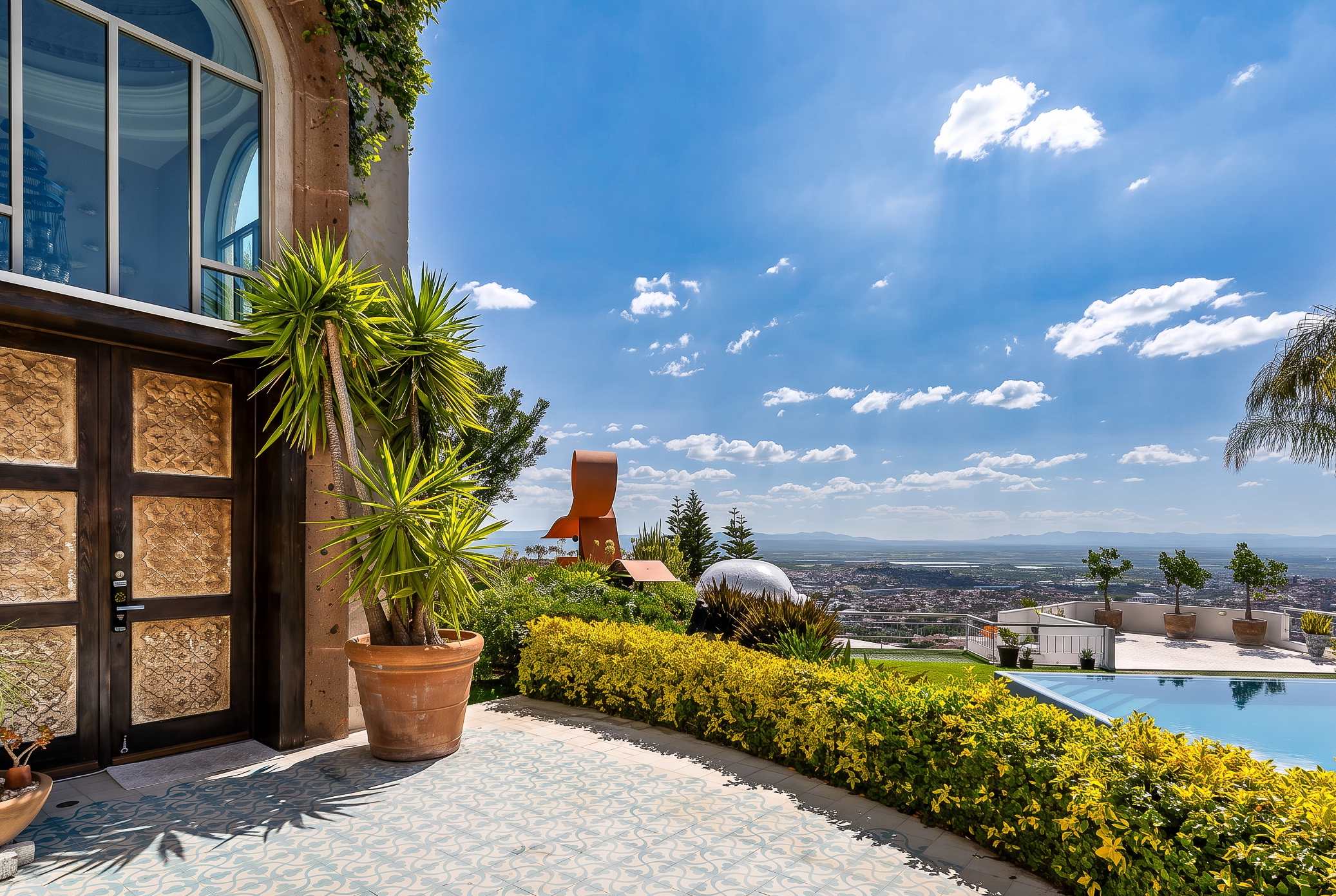 Entrance to the home, overlooking the pool
