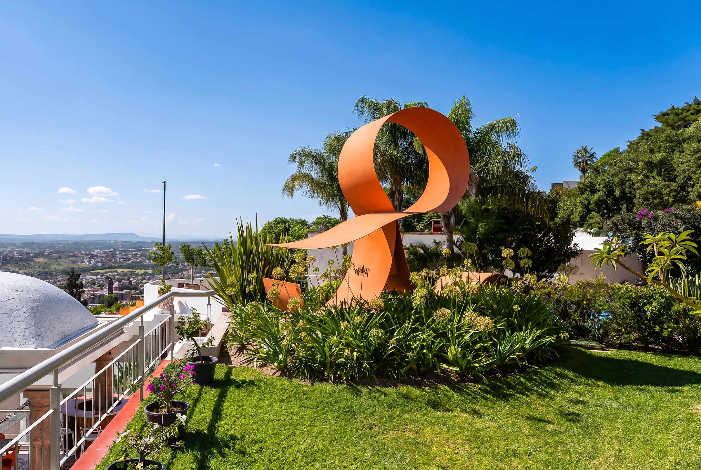 Shared garden space with sculptures throughout