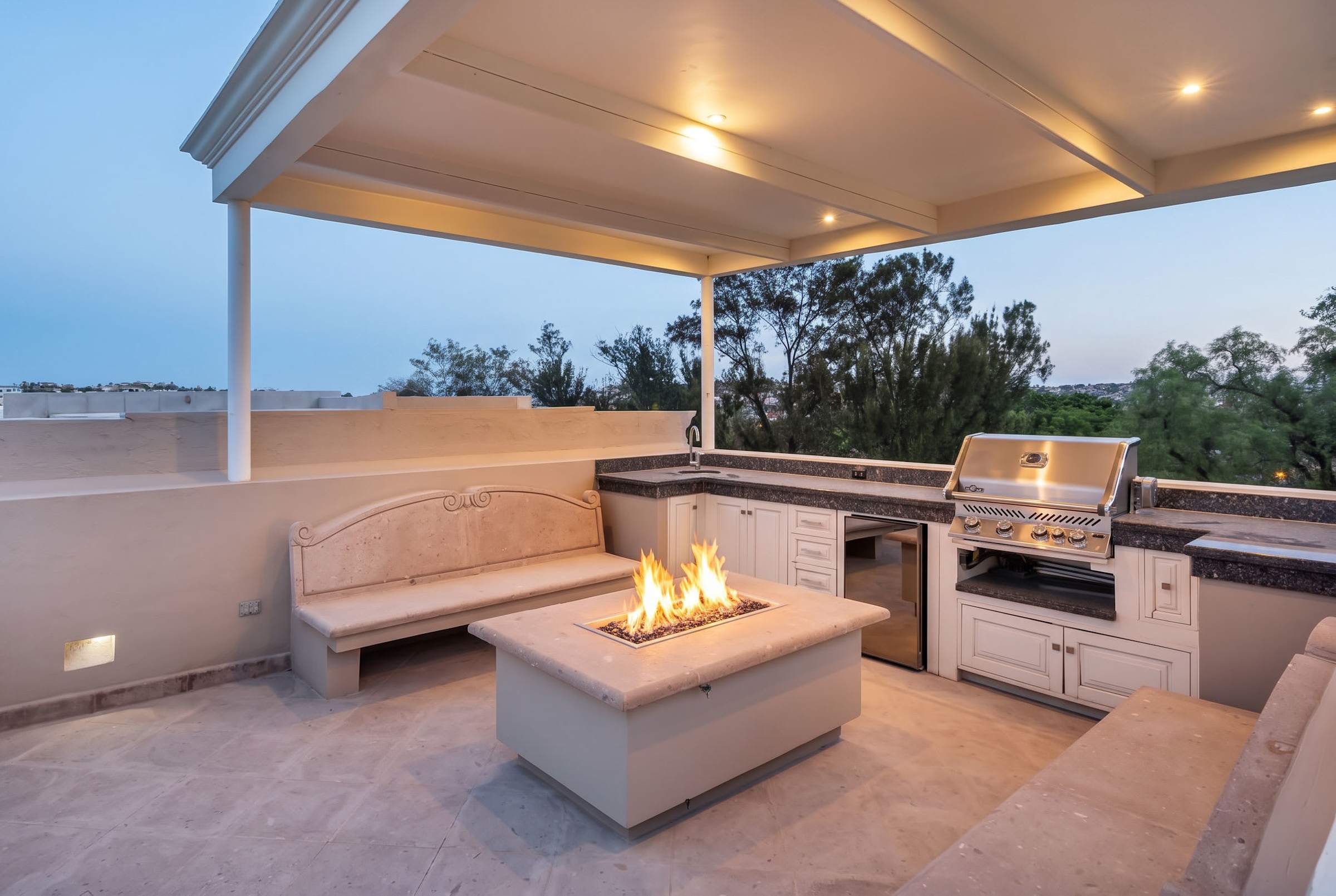 Private rooftop with outdoor kitchen and fire pit