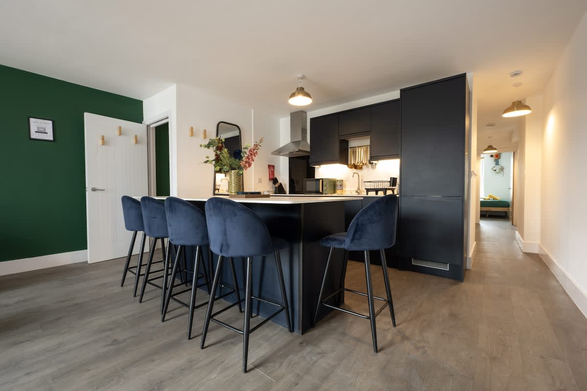 Bright open-plan living and dining area with Island