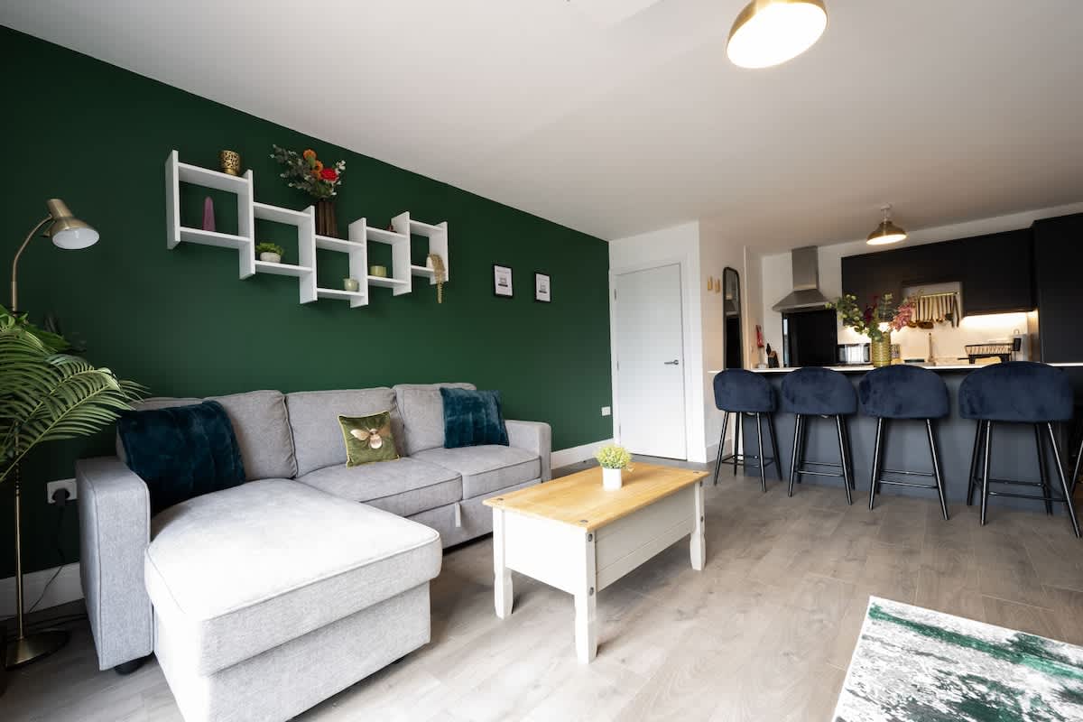 Spacious living area with comfortable sofa and dining space