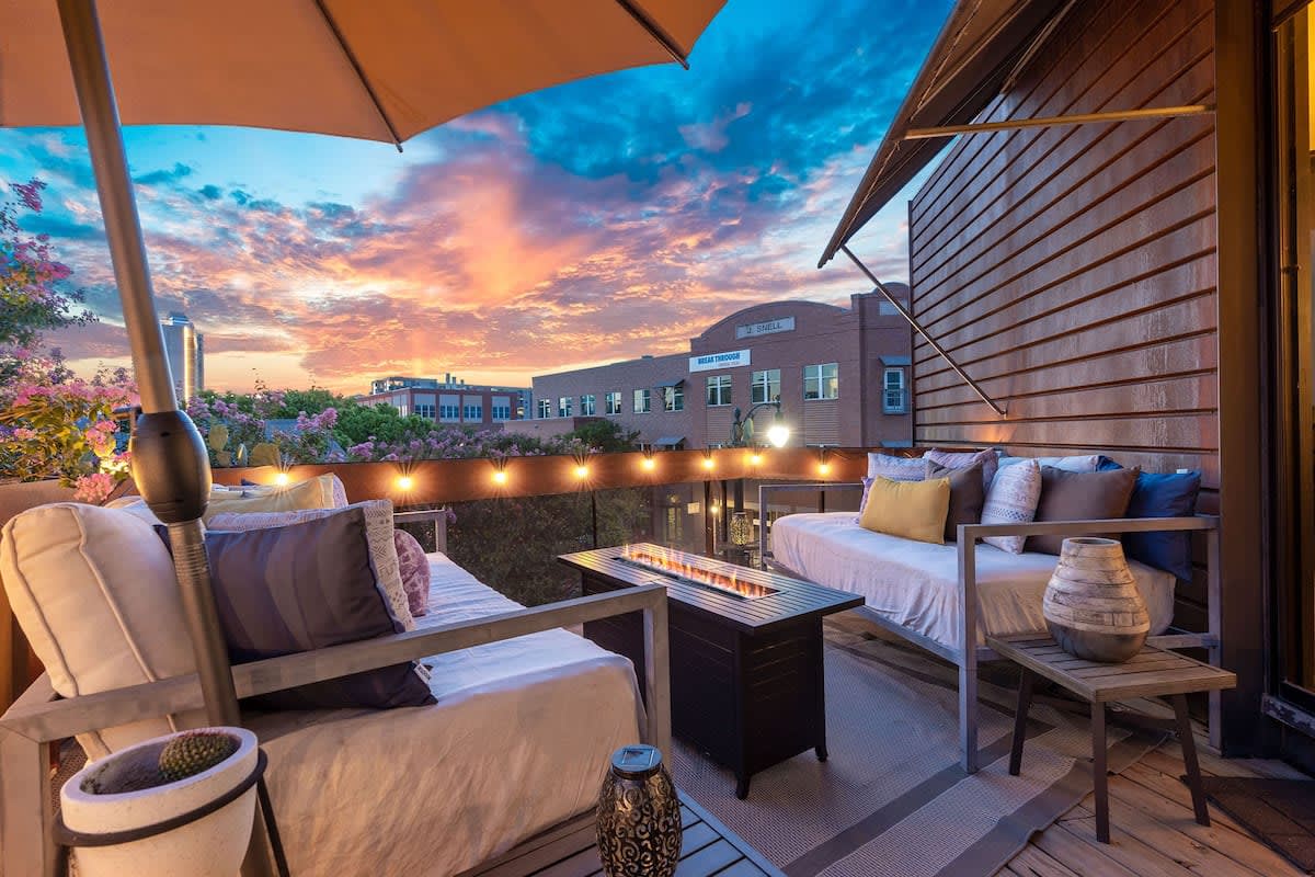 Outdoor lounging area with firepit