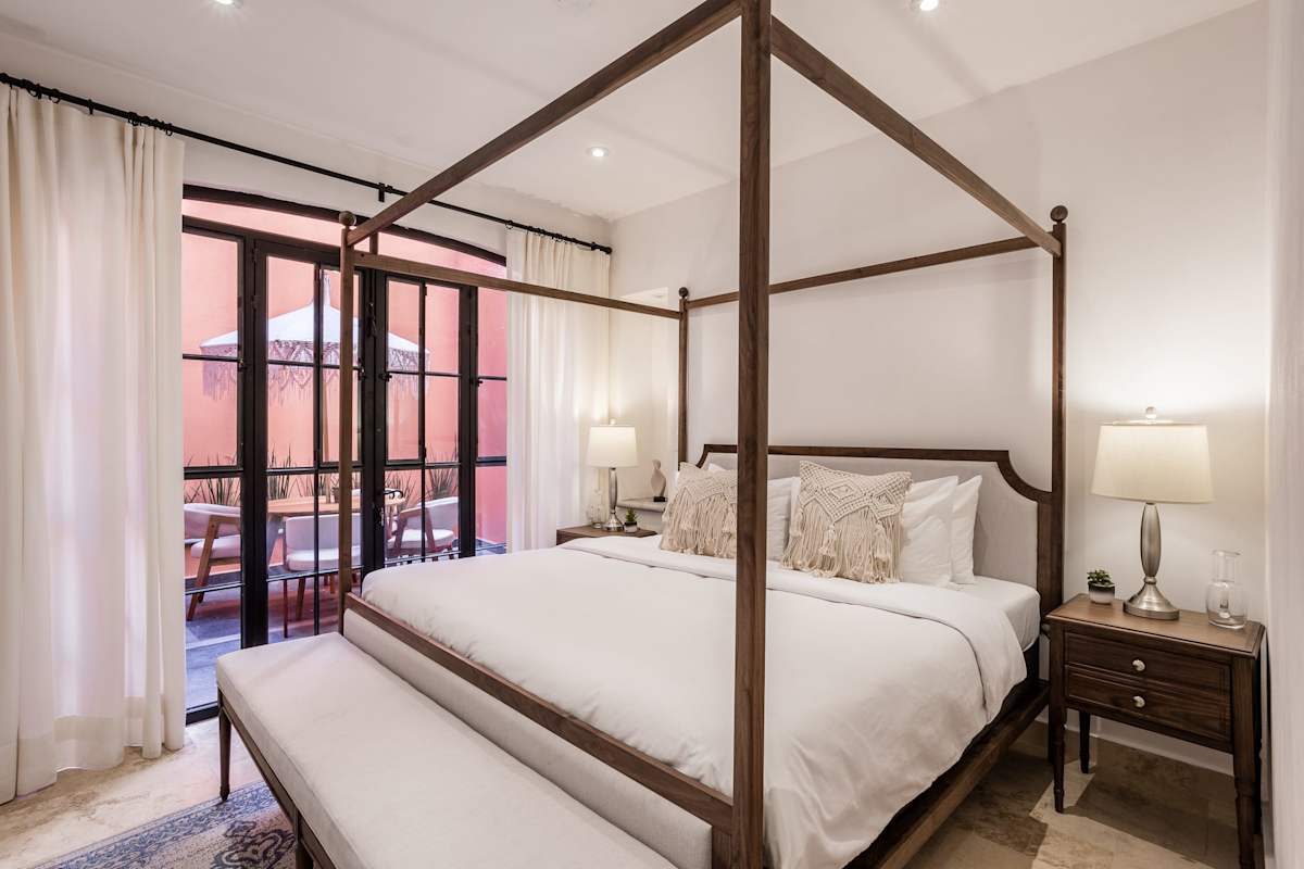 Bedroom with king bed and patio