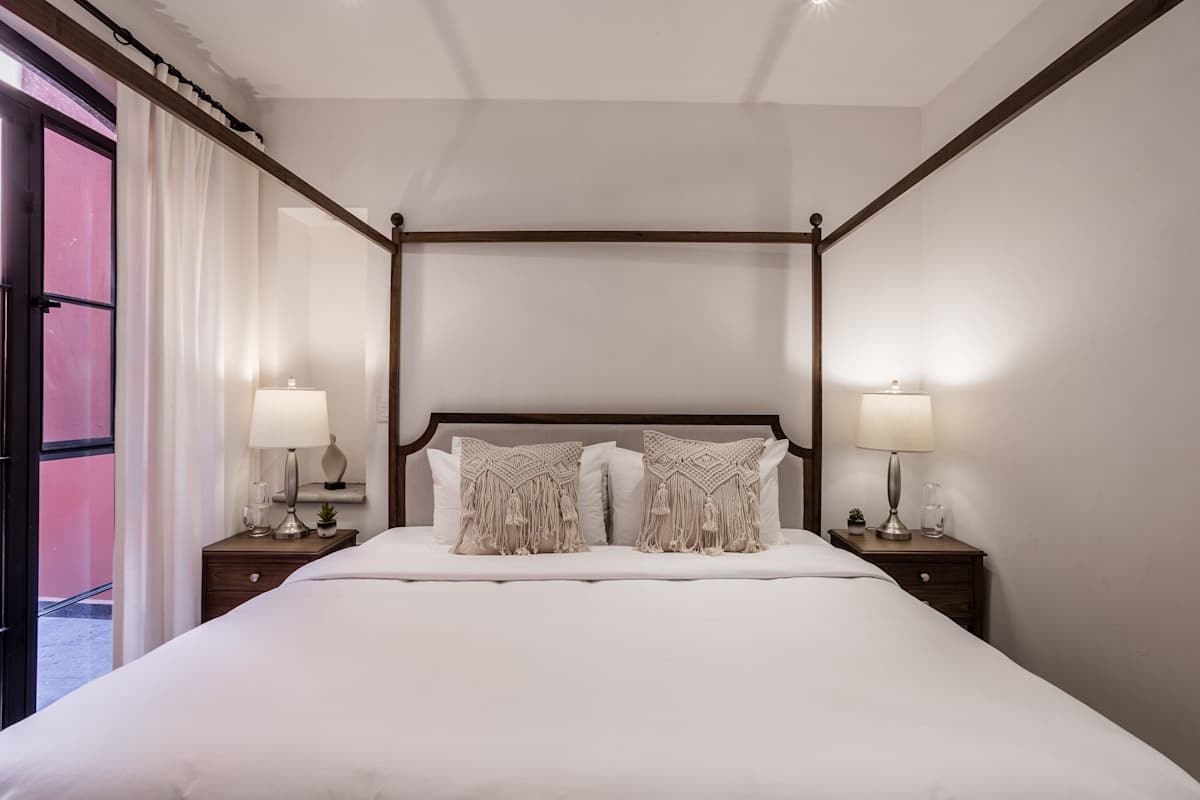 Bedroom with king bed and patio