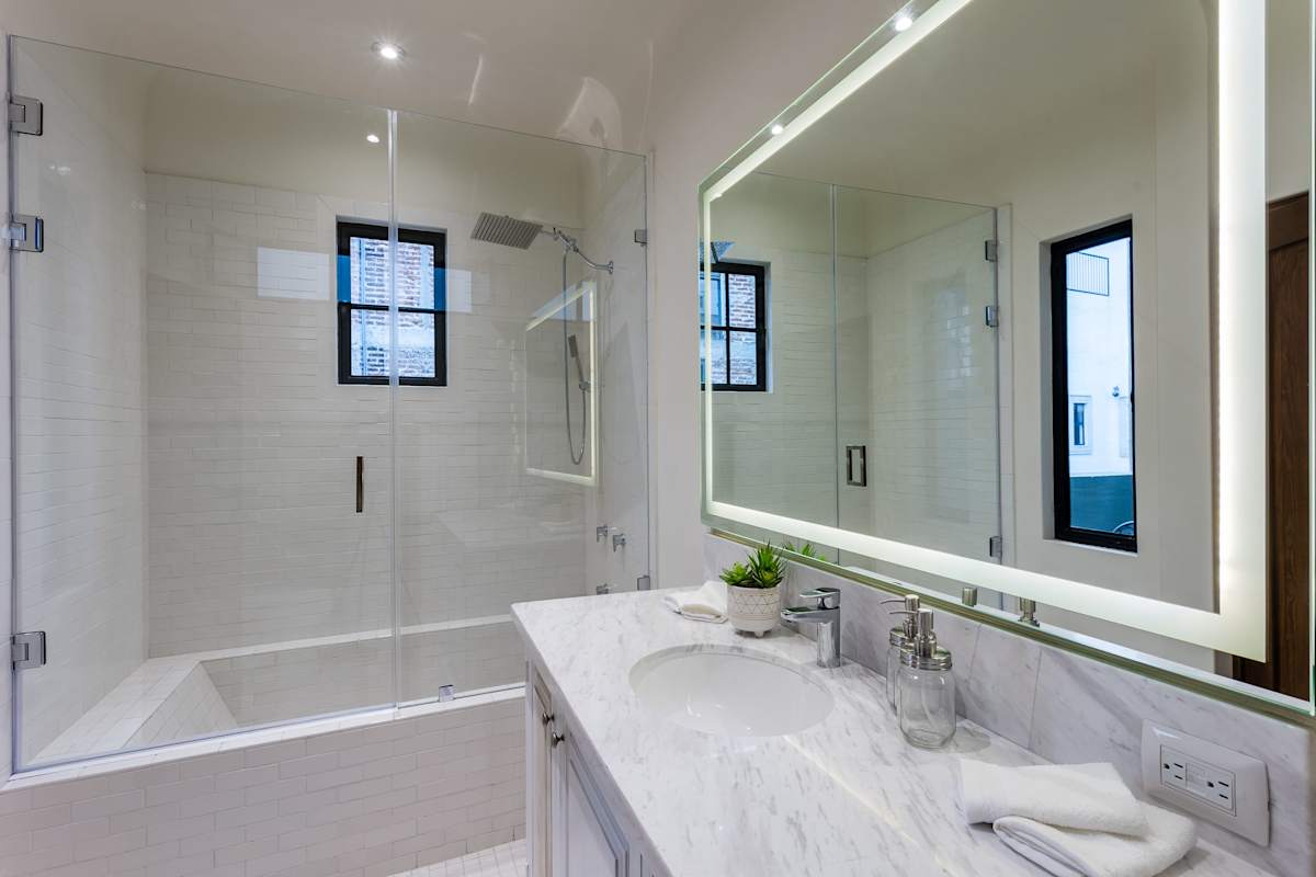 Bathroom with shower and bathtub