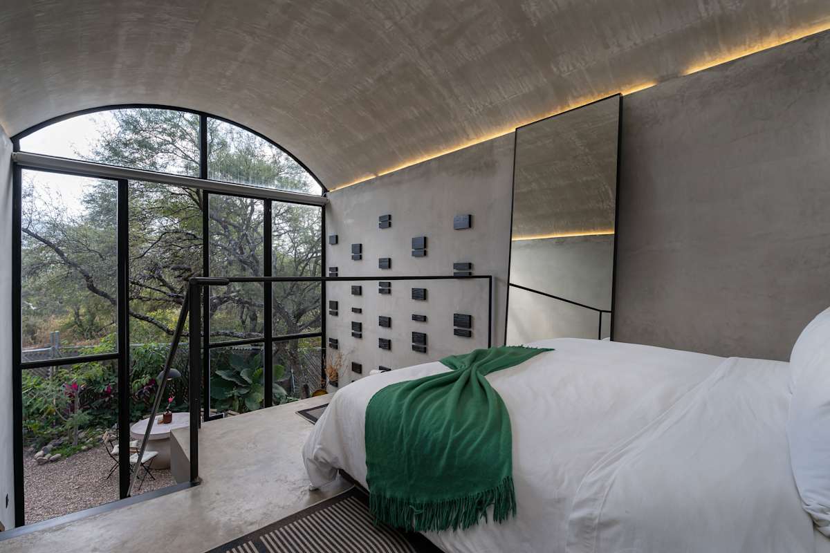 Scenic views from out the glass windows from the loft-style king bedroom.