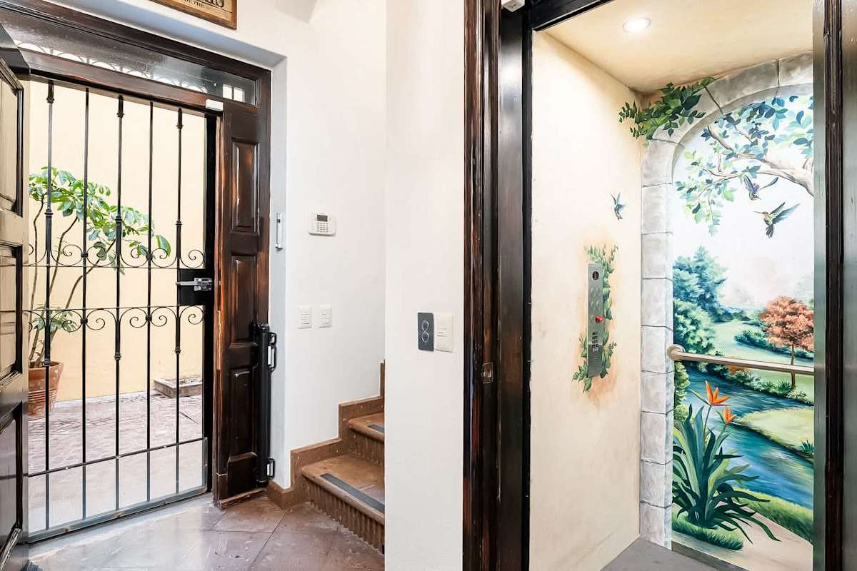 In-home elevator, near the front entrance.