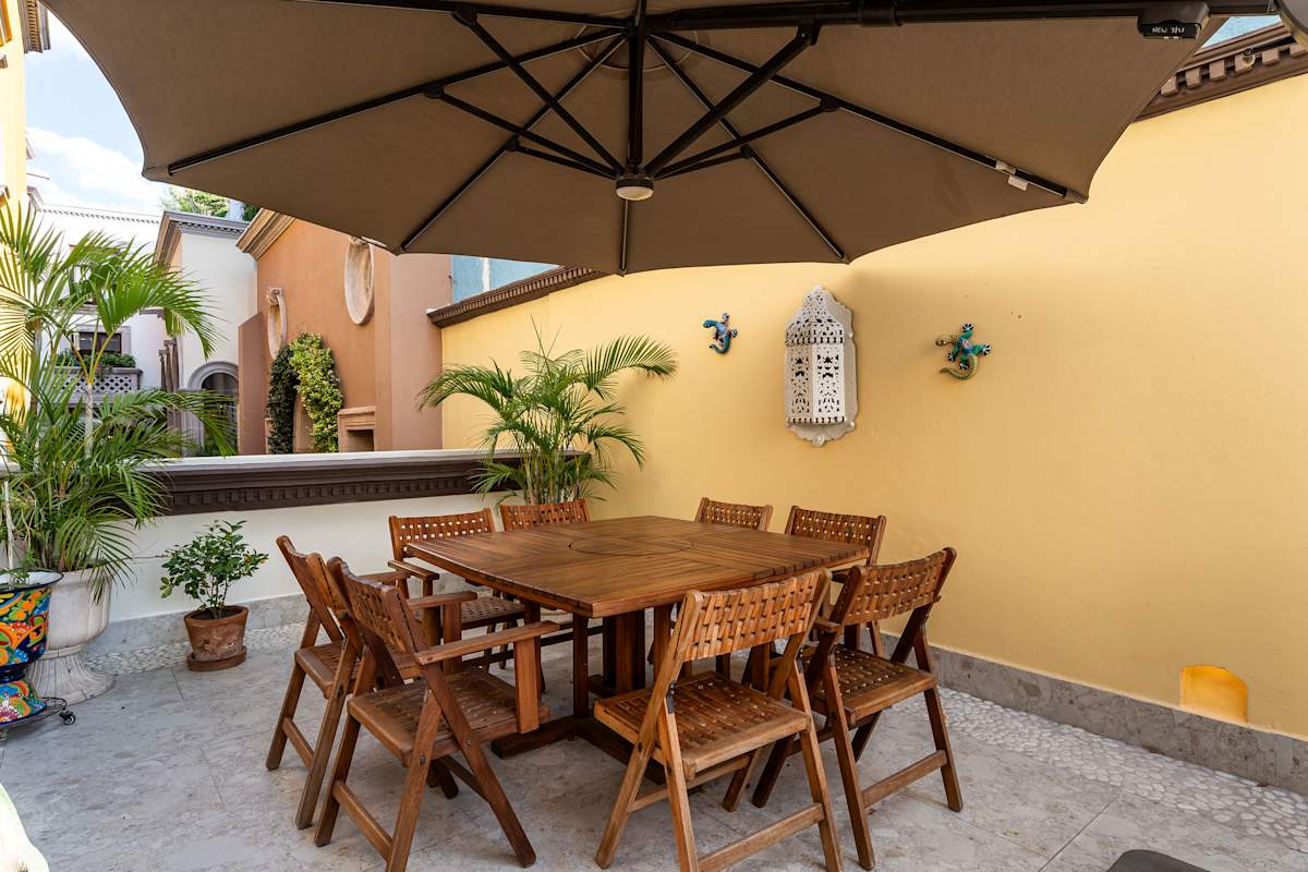 Patio with outdoor dining furniture.