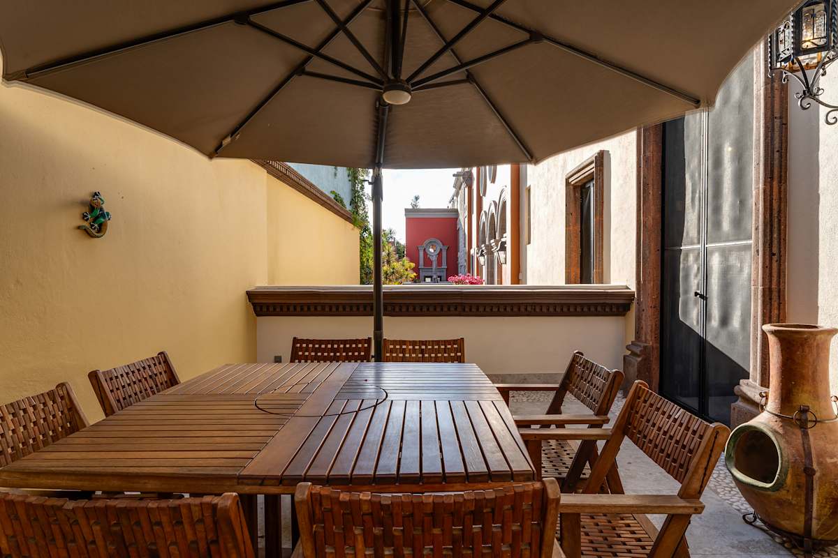 Patio with outdoor dining furniture.