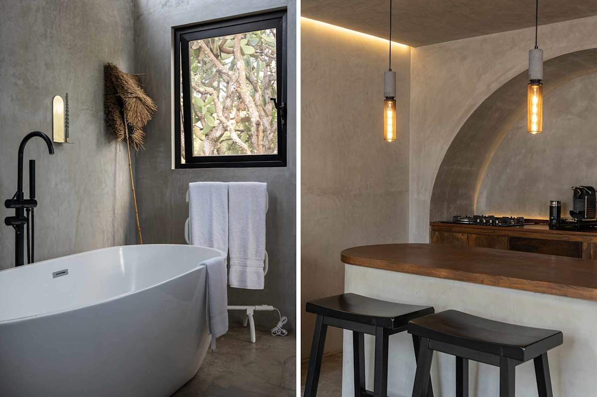 A deep soaking tub in the bathroom and kitchen inside the home.