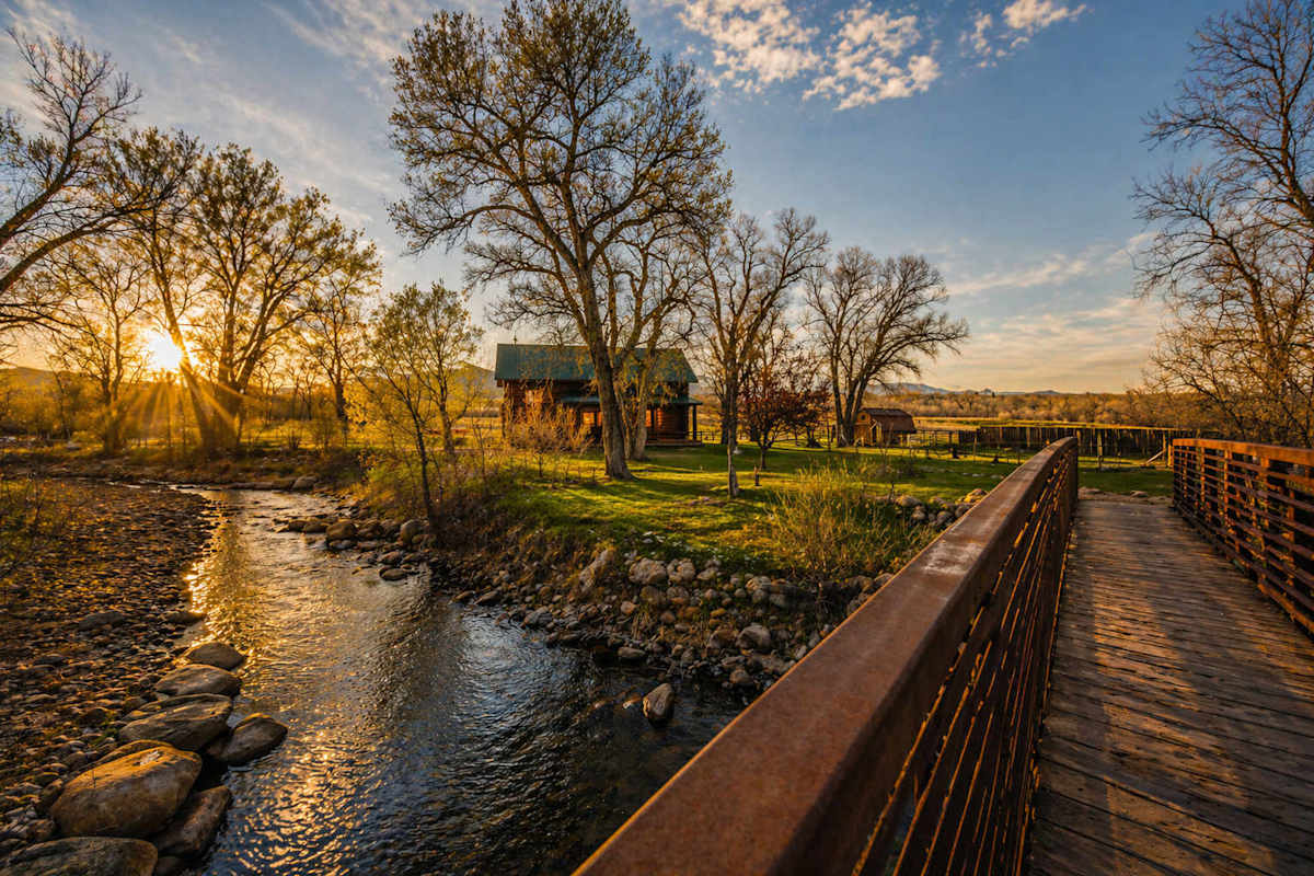 Clear Creek at sunset beside the property footbridge, Clear Creek Crossing, Buffalo, Wyoming