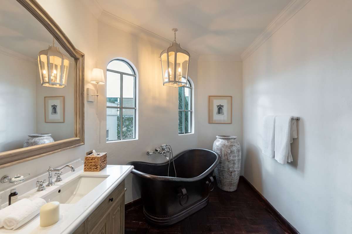Suite 1: Ensuite bathroom with shower and copper soaking tub
