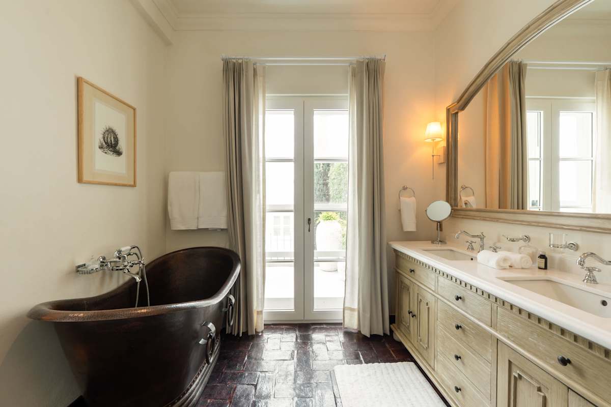 Suite 2: Ensuite bathroom with shower and copper soaking tub, private terrace