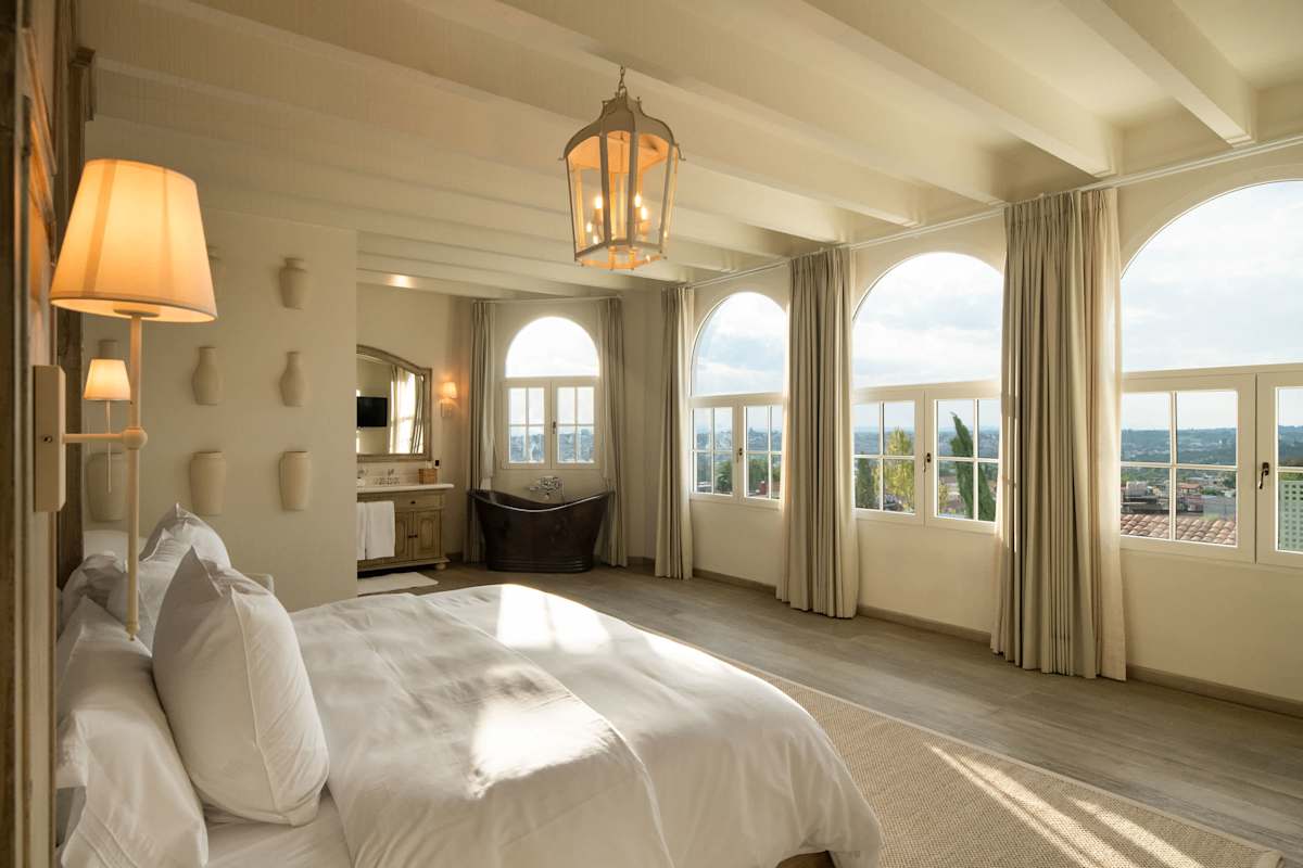 Suite 4: Ensuite bathroom with shower and copper soaking tub, city and church views