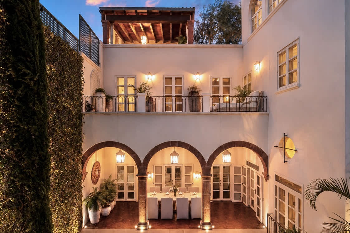 Full exterior view of the estate at twilight
