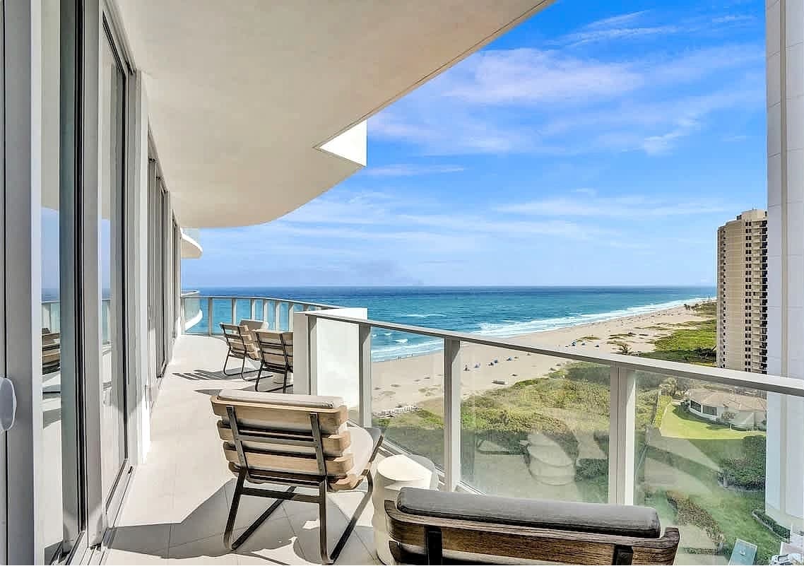 
Spacious balcony with sweeping ocean and beach views