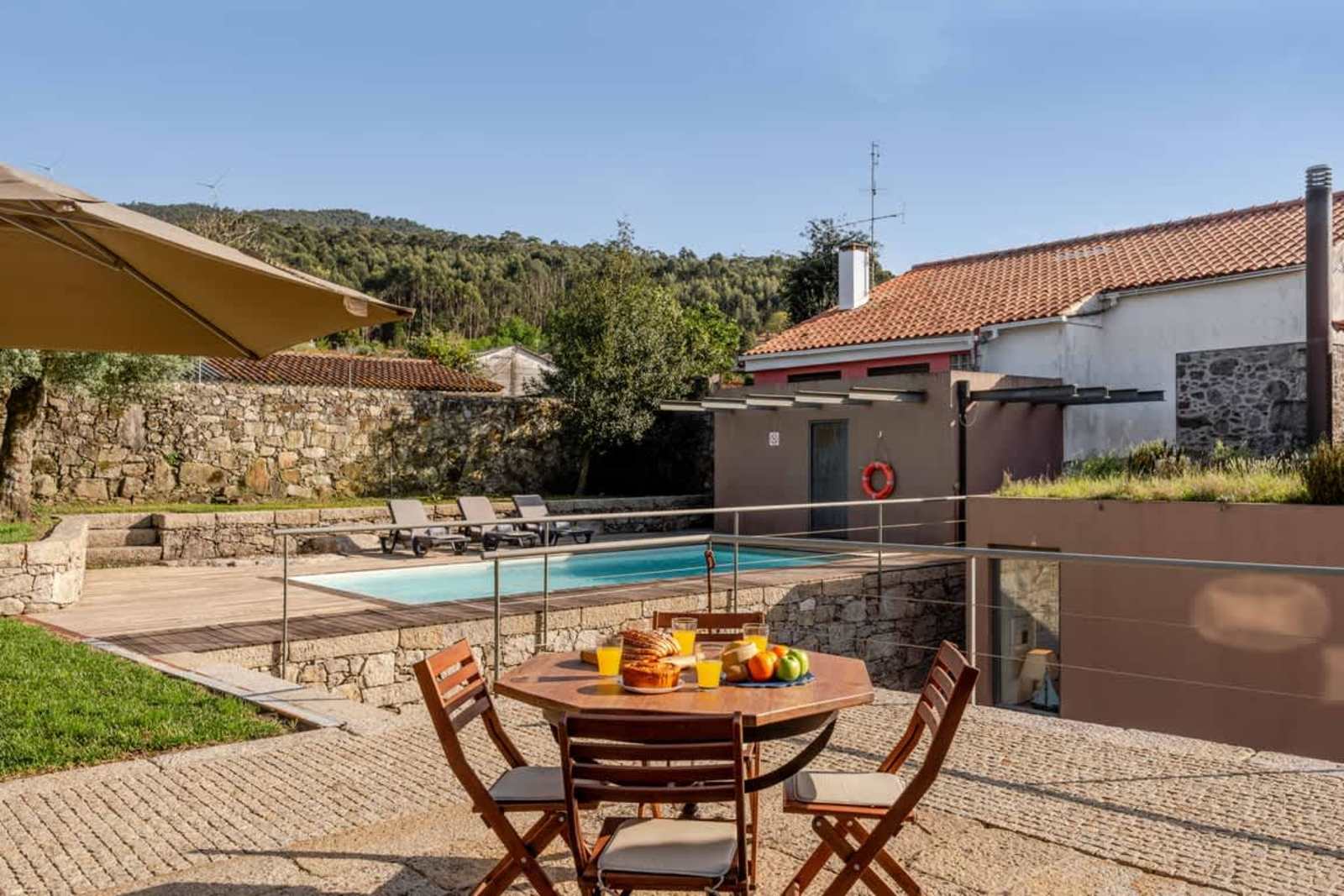 Stone by the Sea I Mountain and Beach Retreat with Pool – luxury villa in Minho Coast, Portugal – image 16