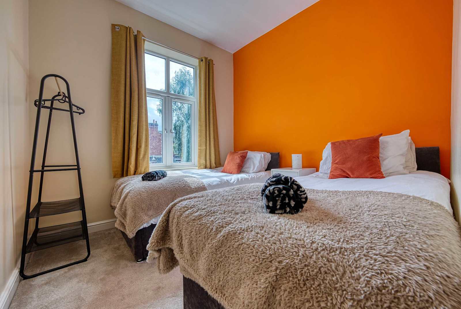 Two cozy beds, twice the comfort. A perfect little space for rest, dreams, and shared memories.