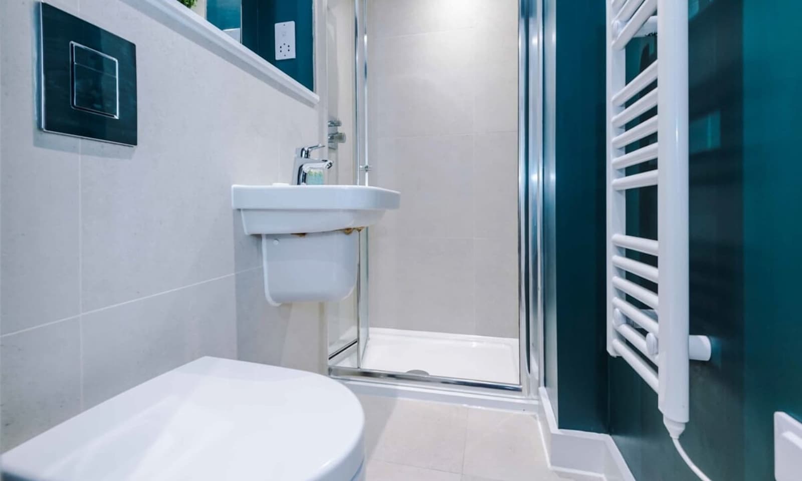 A modern full bathroom offering comfort and style for a refreshing start to your day