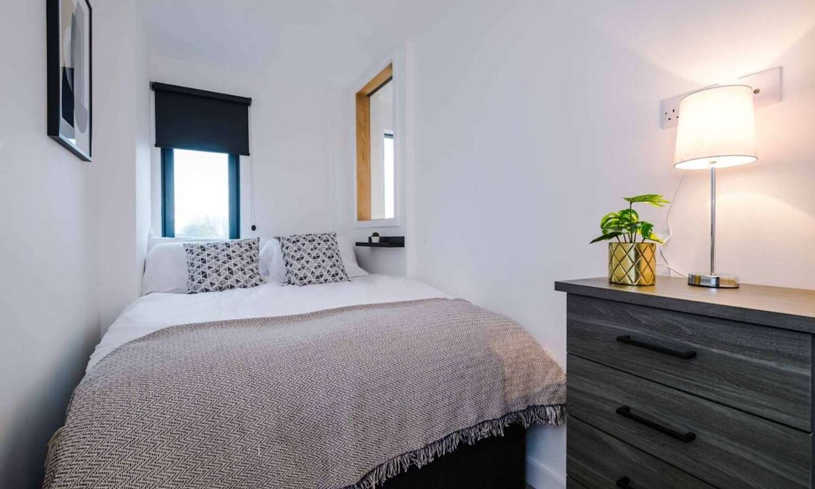 A spacious and inviting bedroom with a double bed, perfect for restful sleep