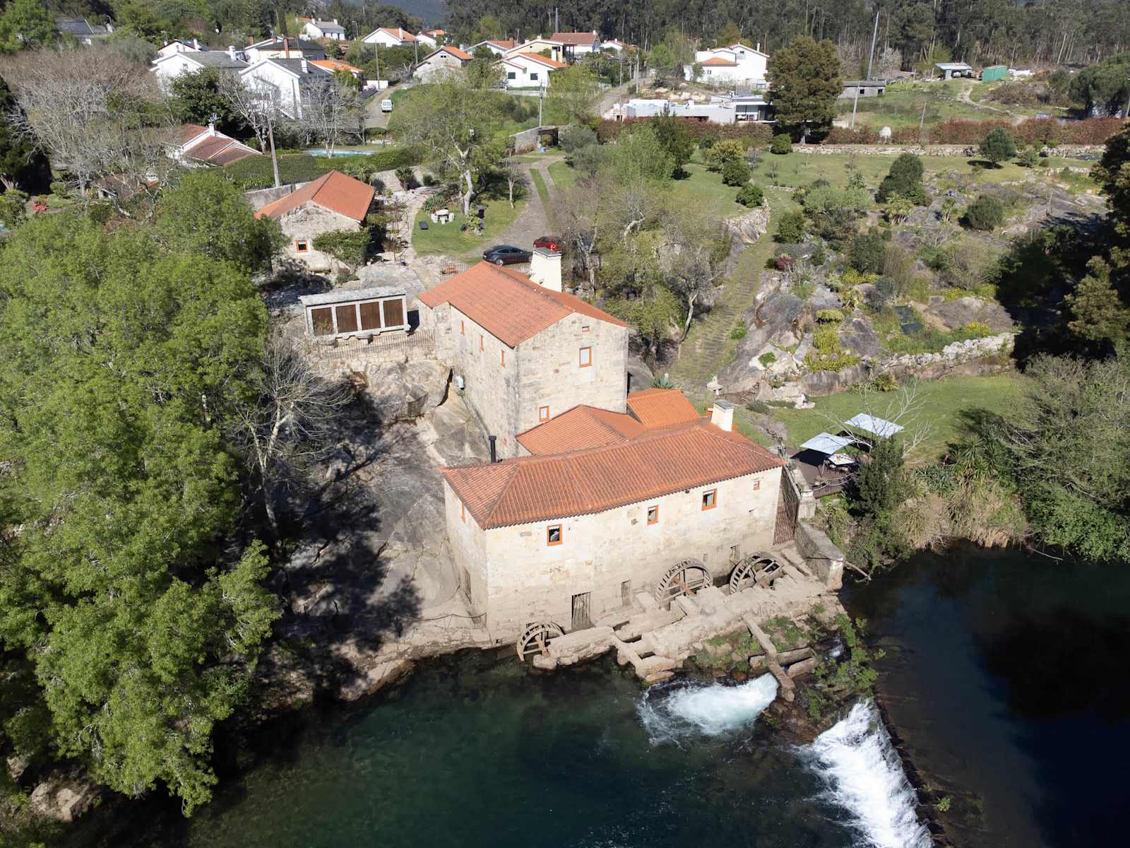 Historic Riverfront Watermill · Private Beach Access – luxury villa in Minho Coast, Portugal – image 5