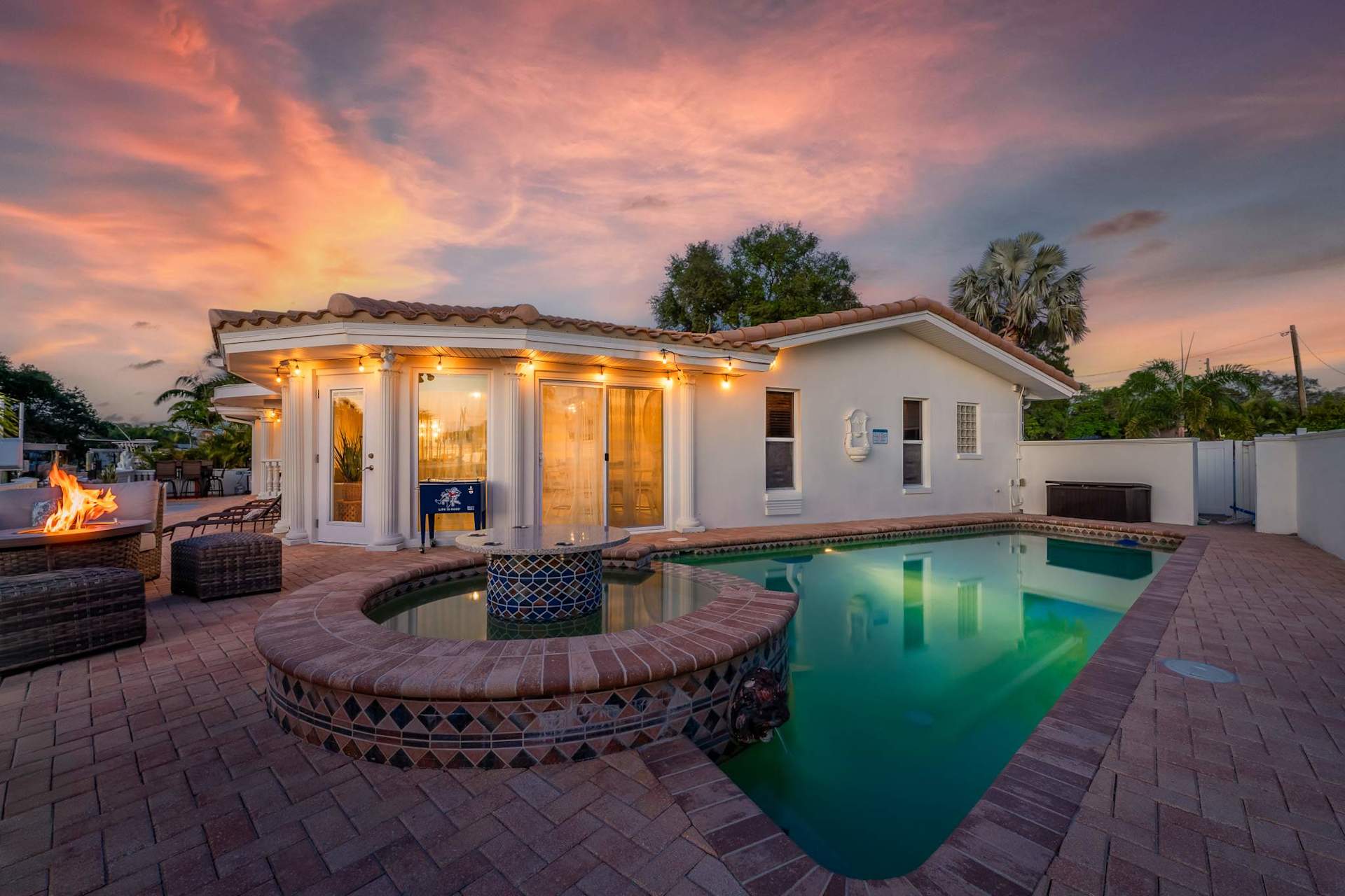 Sunset over a private pool home on the Gulf Coast
