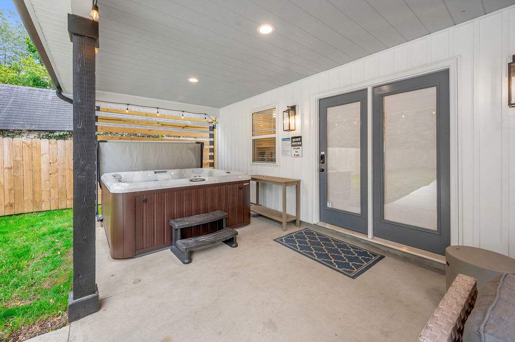 Sink into the hot tub under string lights and let the day melt away — it's ready and waiting any hour you want it.