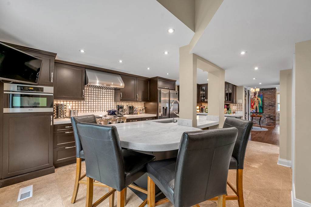 Designed for connection and comfort, the elegant dining area provides the perfect setting for family meals, casual breakfasts, and intimate dinners with friends. It's a place where stories are shared and lasting memories are made.