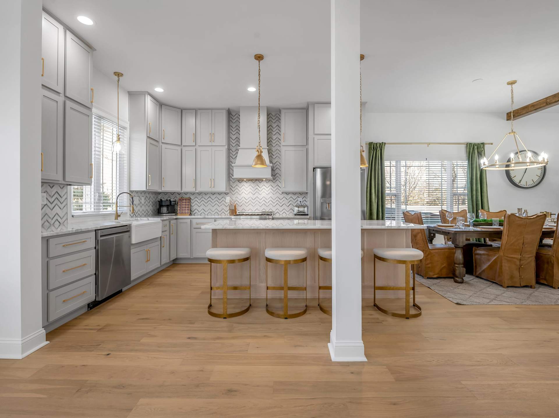 Cook like a pro in your high-end kitchen — a huge island, top-tier appliances, and casual seating keep everyone close while you entertain.