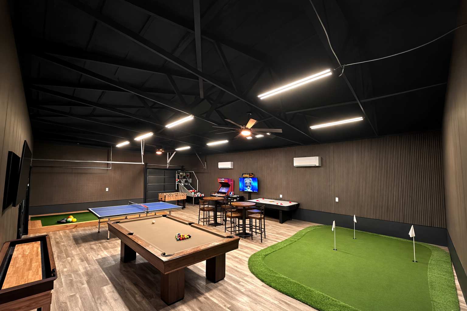 The game room offers a lively escape with plenty of space to play, unwind, and enjoy time together. It’s the ideal spot for rainy days, evenings in, or family fun.
