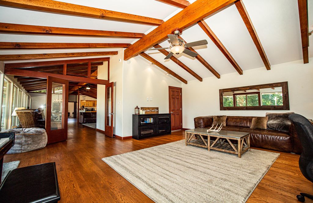 The Writing Room is a perfect remote working space, complete with an HP Laser Printer. There is a queen hideabed here or one extra airbed could be added too. The locked door hides basement storage space.