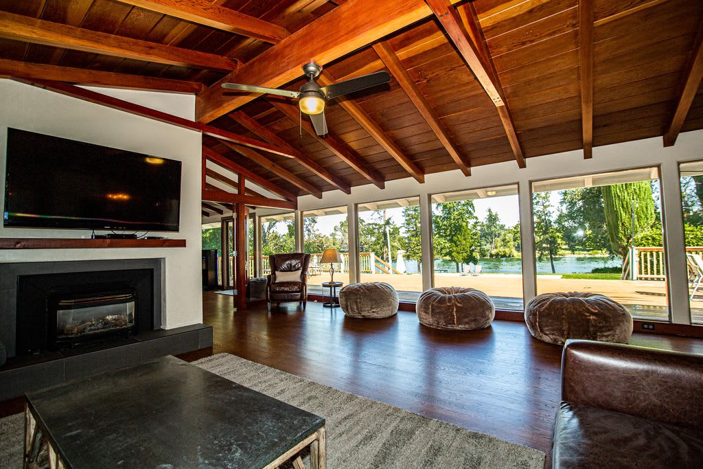 Magnificent views from our Living Room. Comfortable couches, a warm propane fireplace, and streaming TV makes this a perfect space for family gatherings and a game night together.