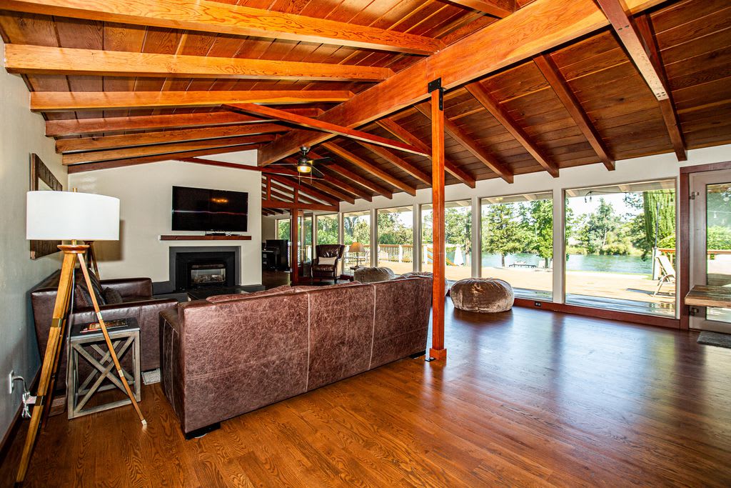 Open Plan Living Room Area with hardwood floors and beautiful picture windows