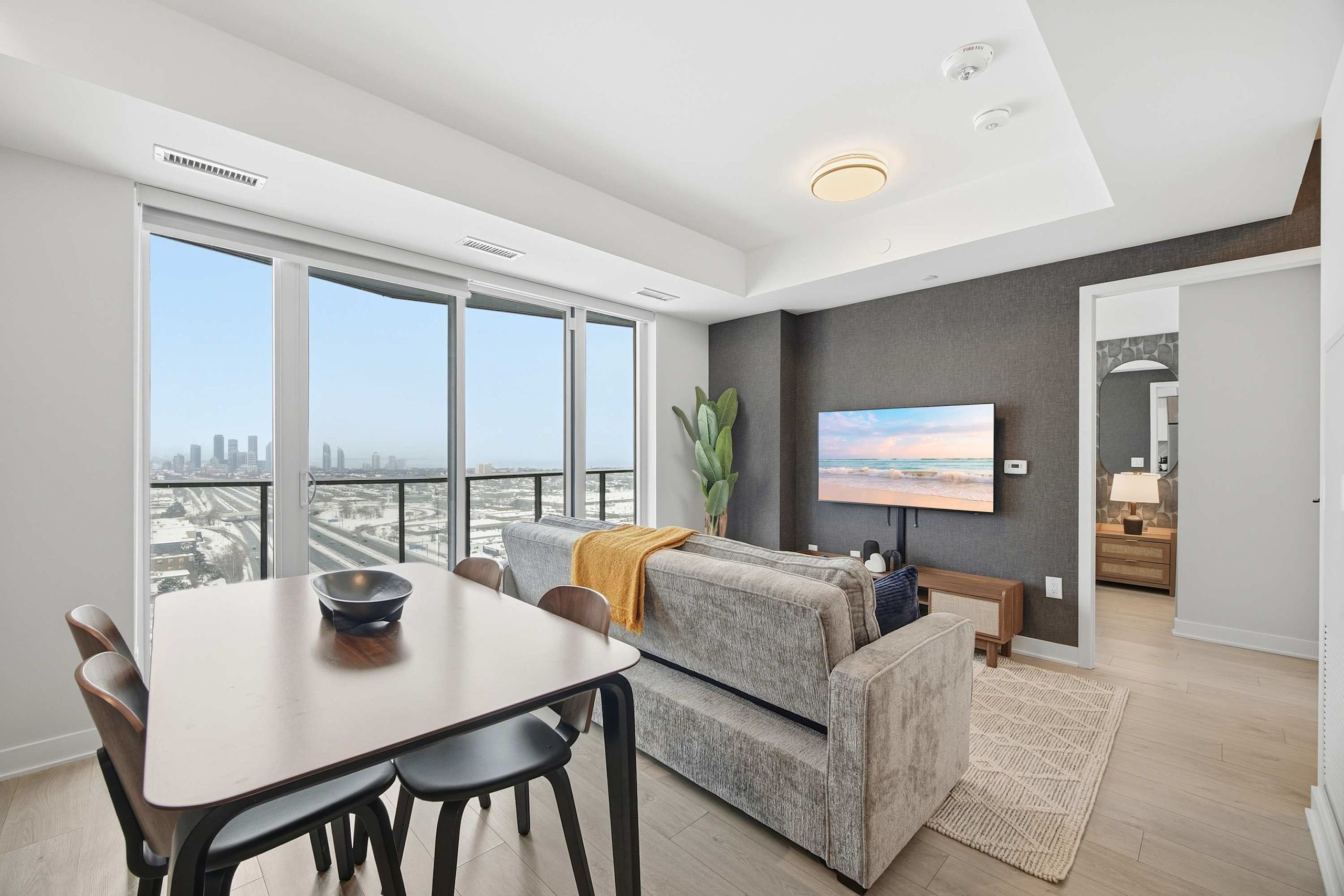Sleek 2BR Condo with Balcony & Skyline Views!-hero-photo
