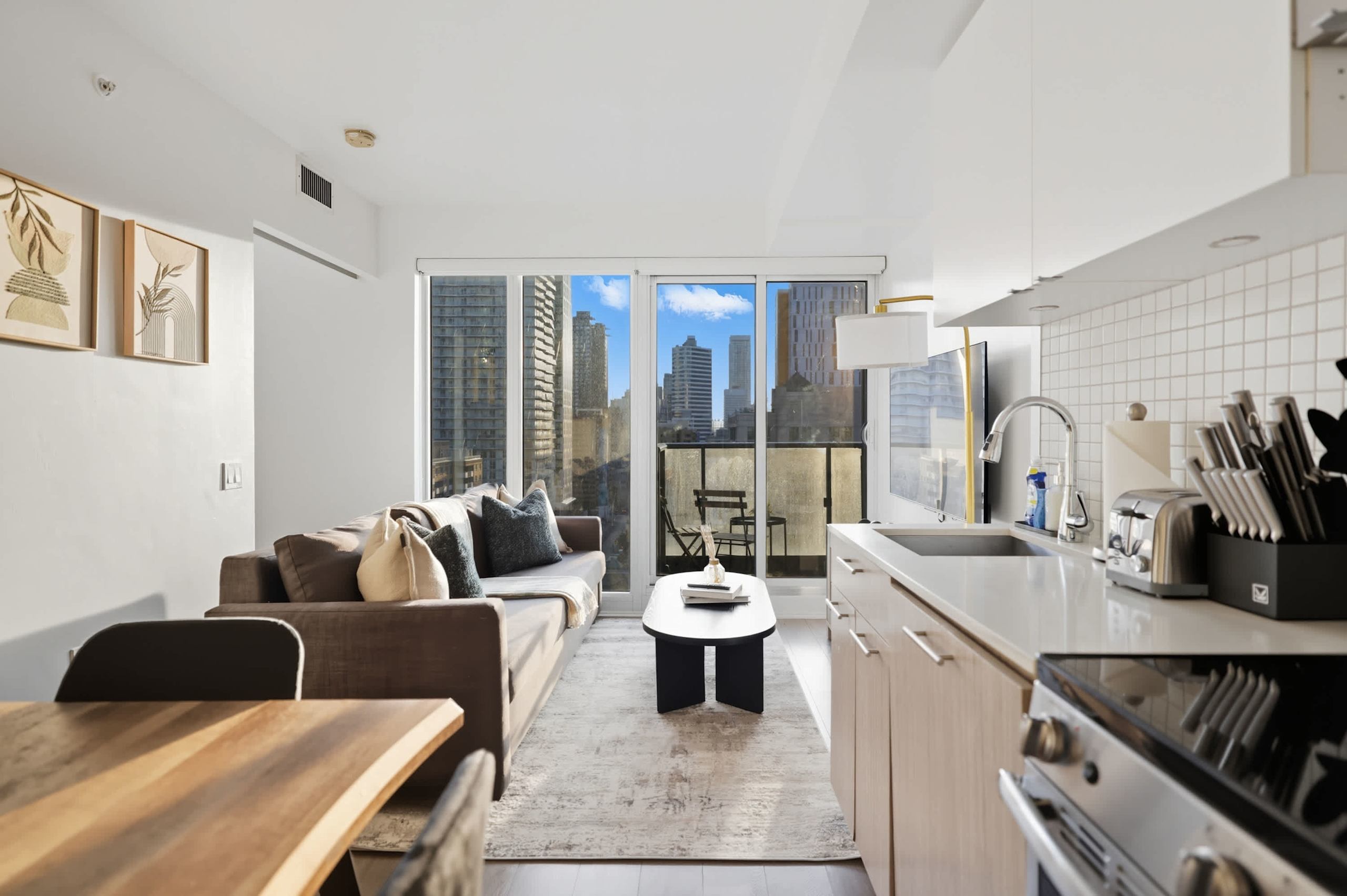 Stylish 2BR Retreat, Patio & Skyline Views-photo-2