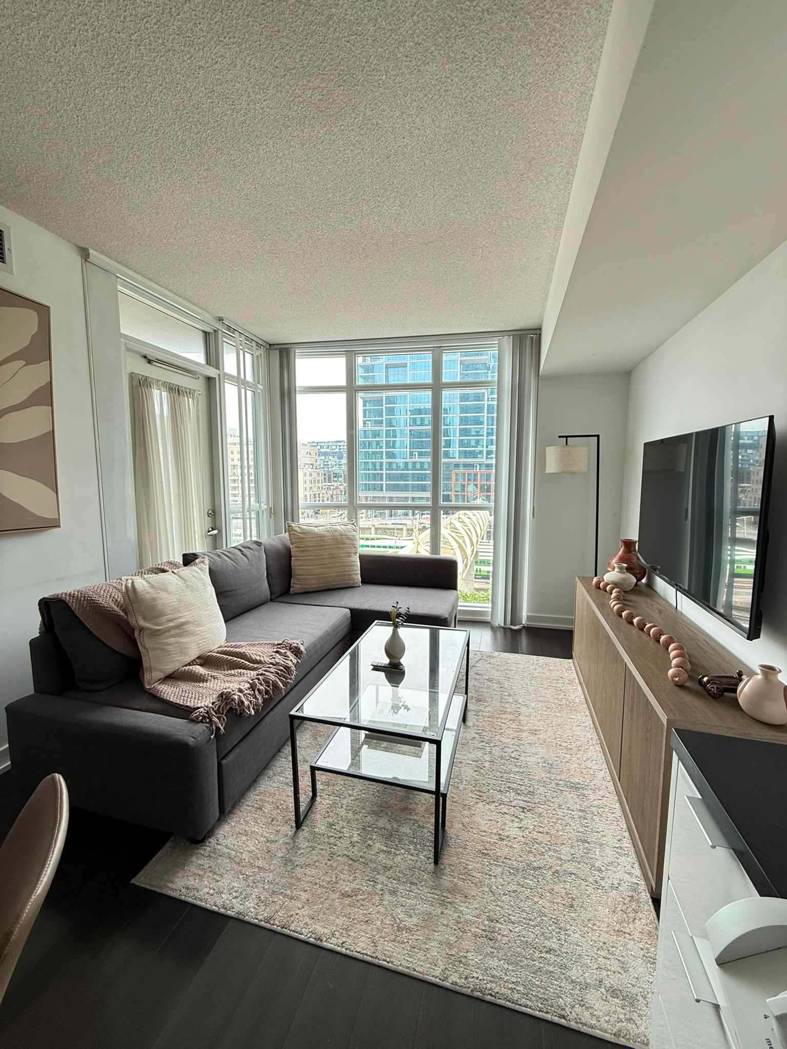 Sleek 1BR+Den City Place Oasis w/ Balcony & TV-hero-photo