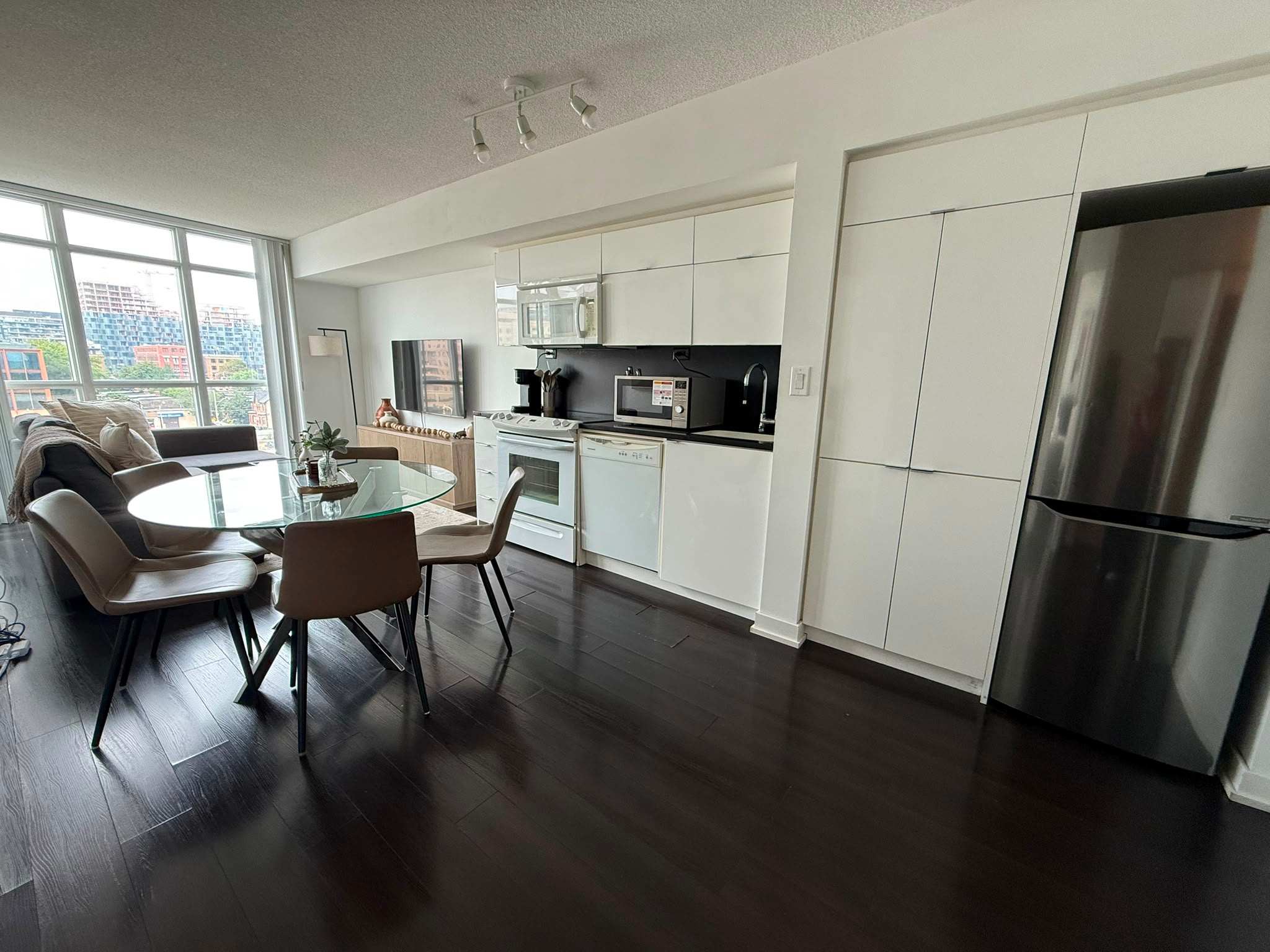 Sleek 1BR+Den City Place Oasis w/ Balcony & TV-photo-3