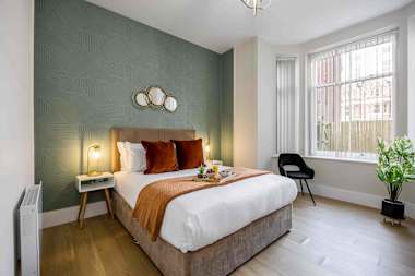 Chic Beachside Escape with Private Garden