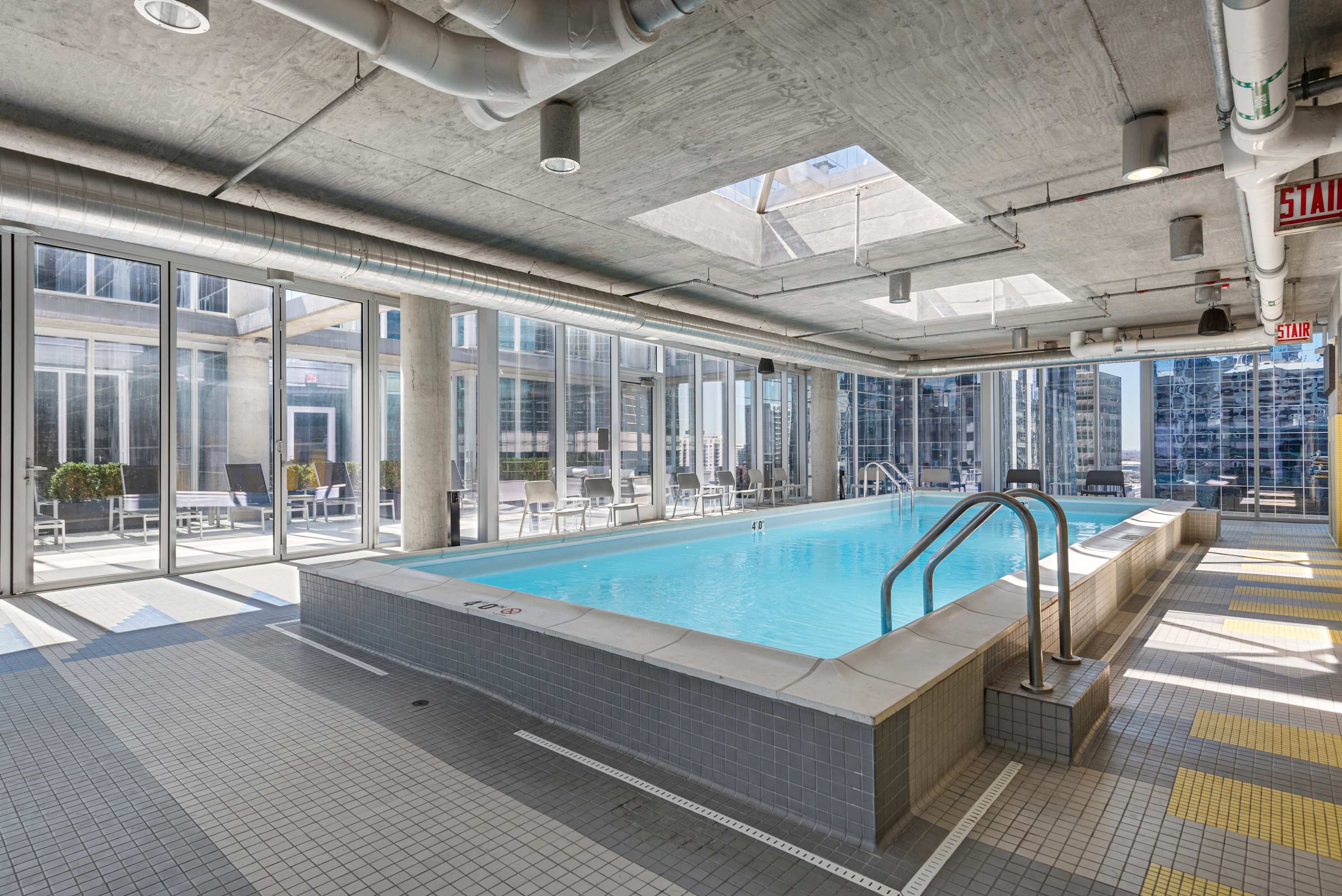Prime 2BR Retreat: Urban Vibes + Views Await interior 4