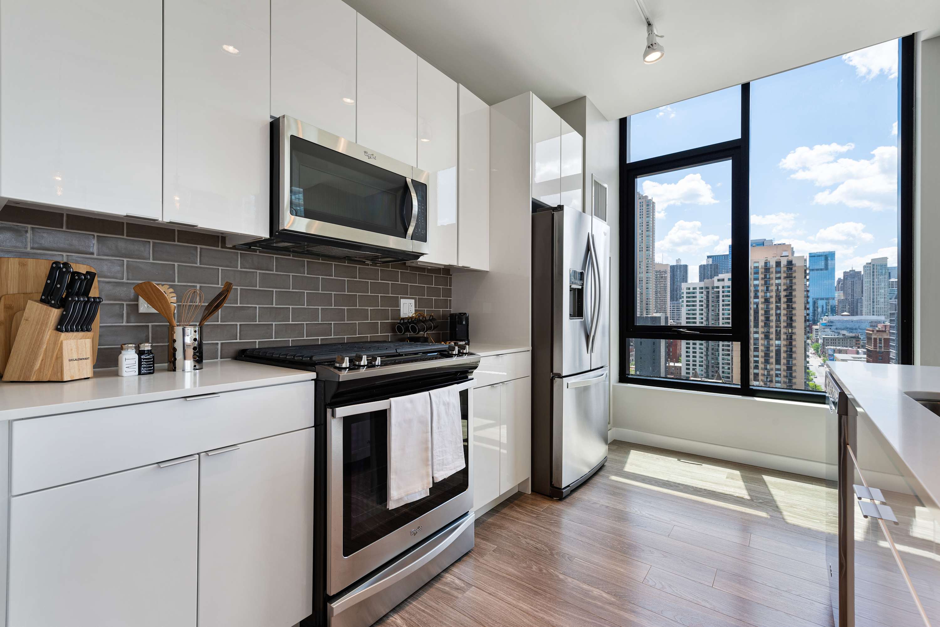 Downtown 2BR Oasis: Skyline Views + Prime Location interior 2