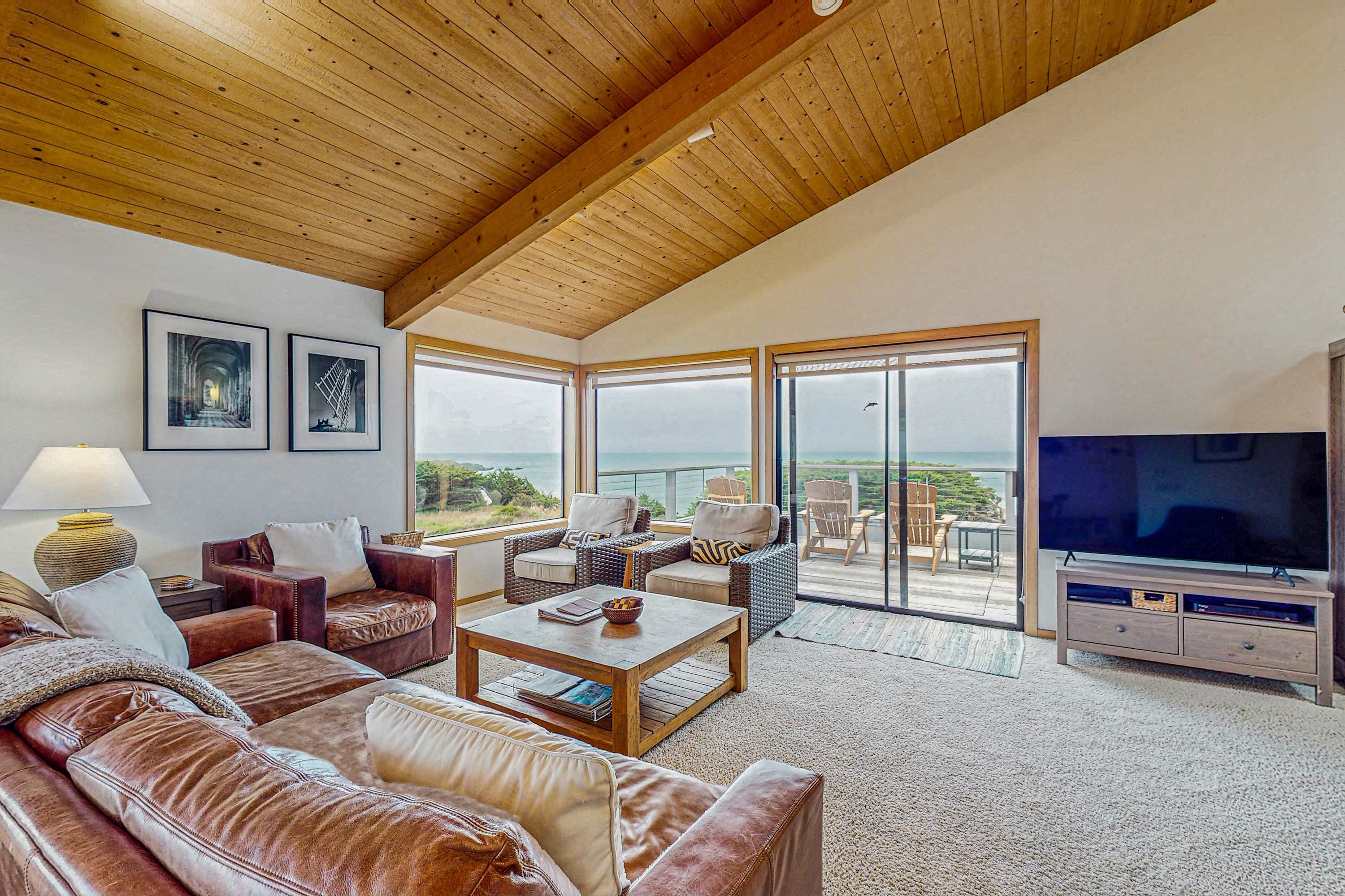 Let ocean views captivate you from the comfort of the living room, a perfect backdrop for your coastal getaway.
