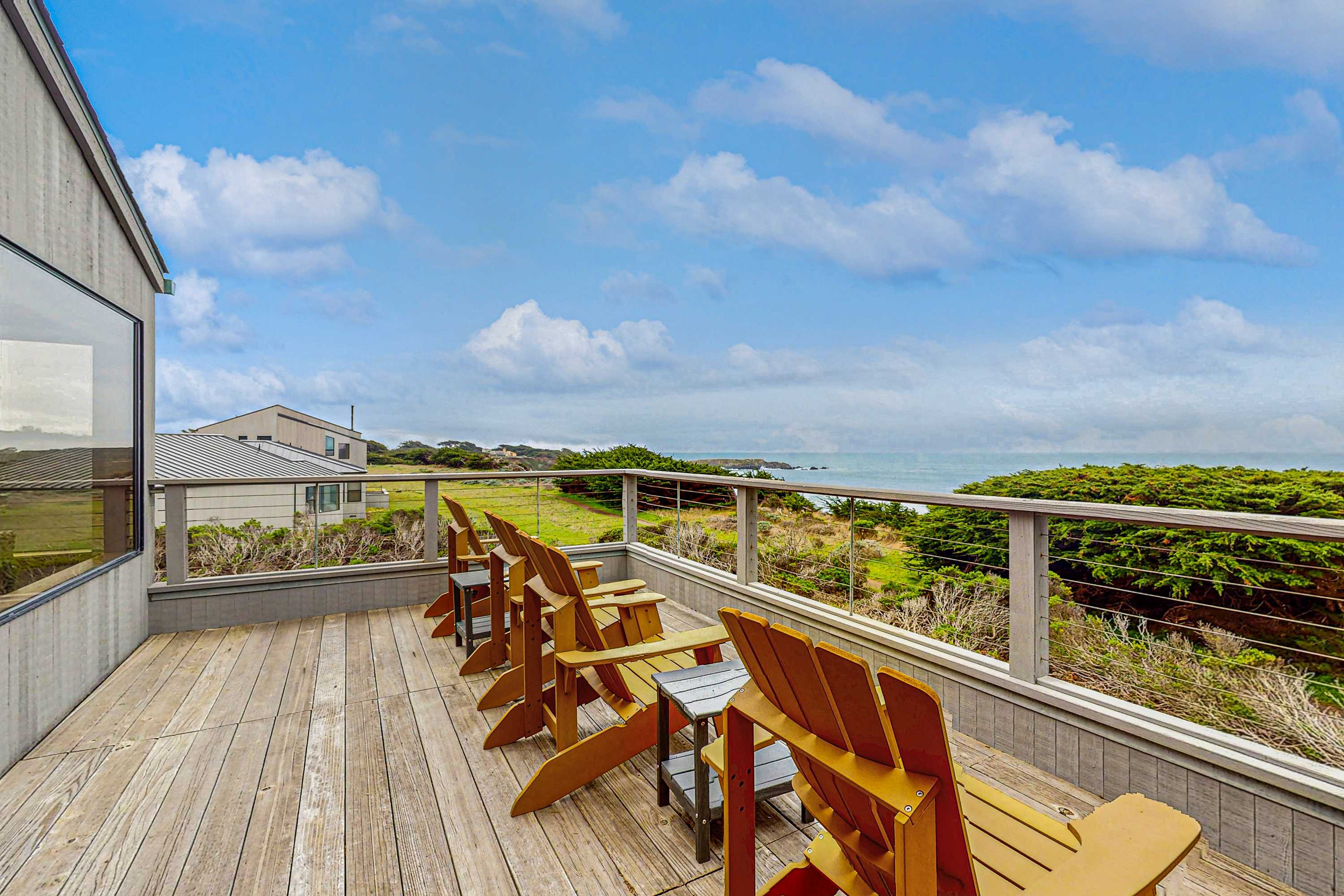 Your morning coffee awaits on the deck, where ocean views and fresh coastal breezes inspire moments of tranquility.
