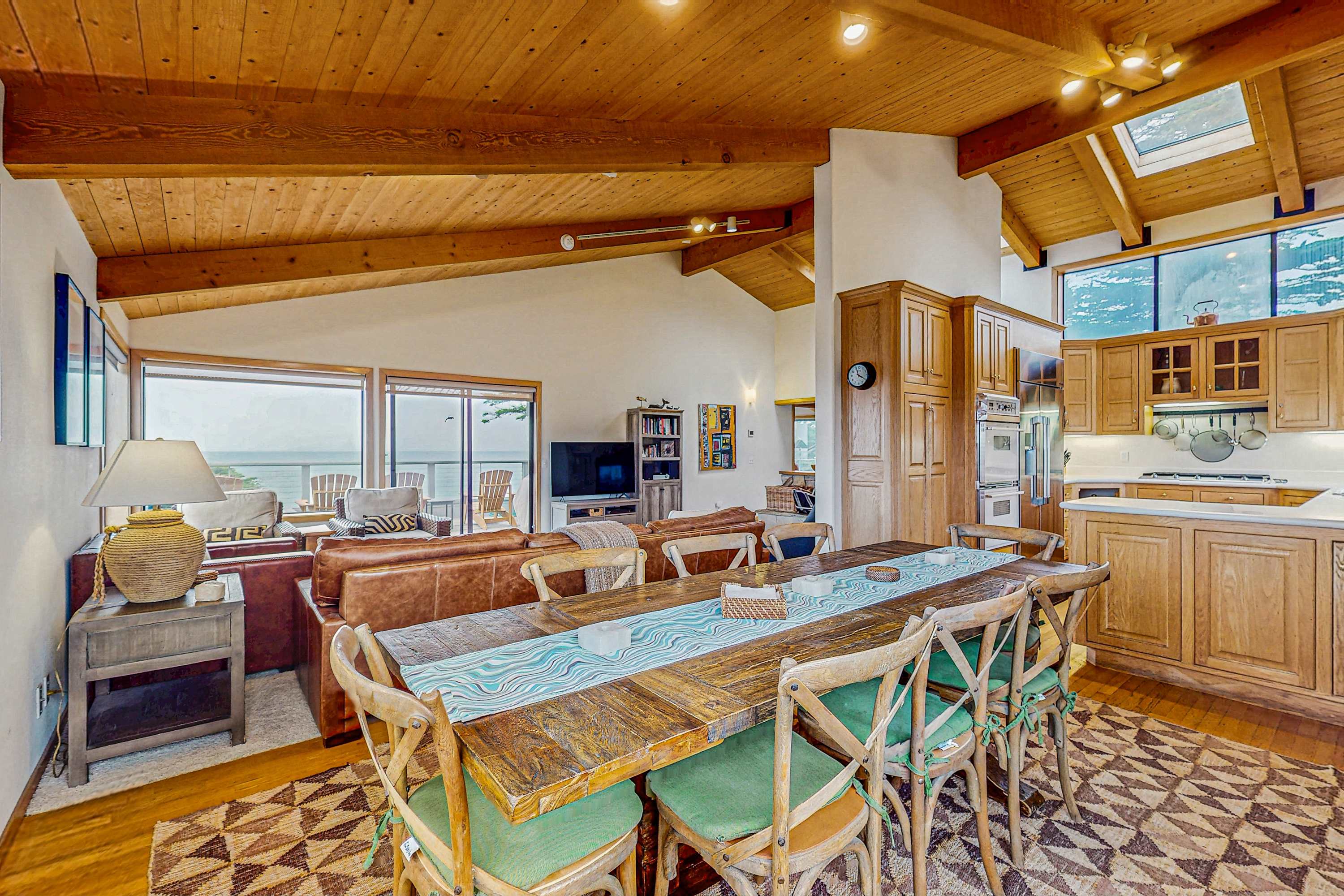 The open-concept living area blends comfort and style, inviting you to relax and enjoy the beauty of your surroundings.