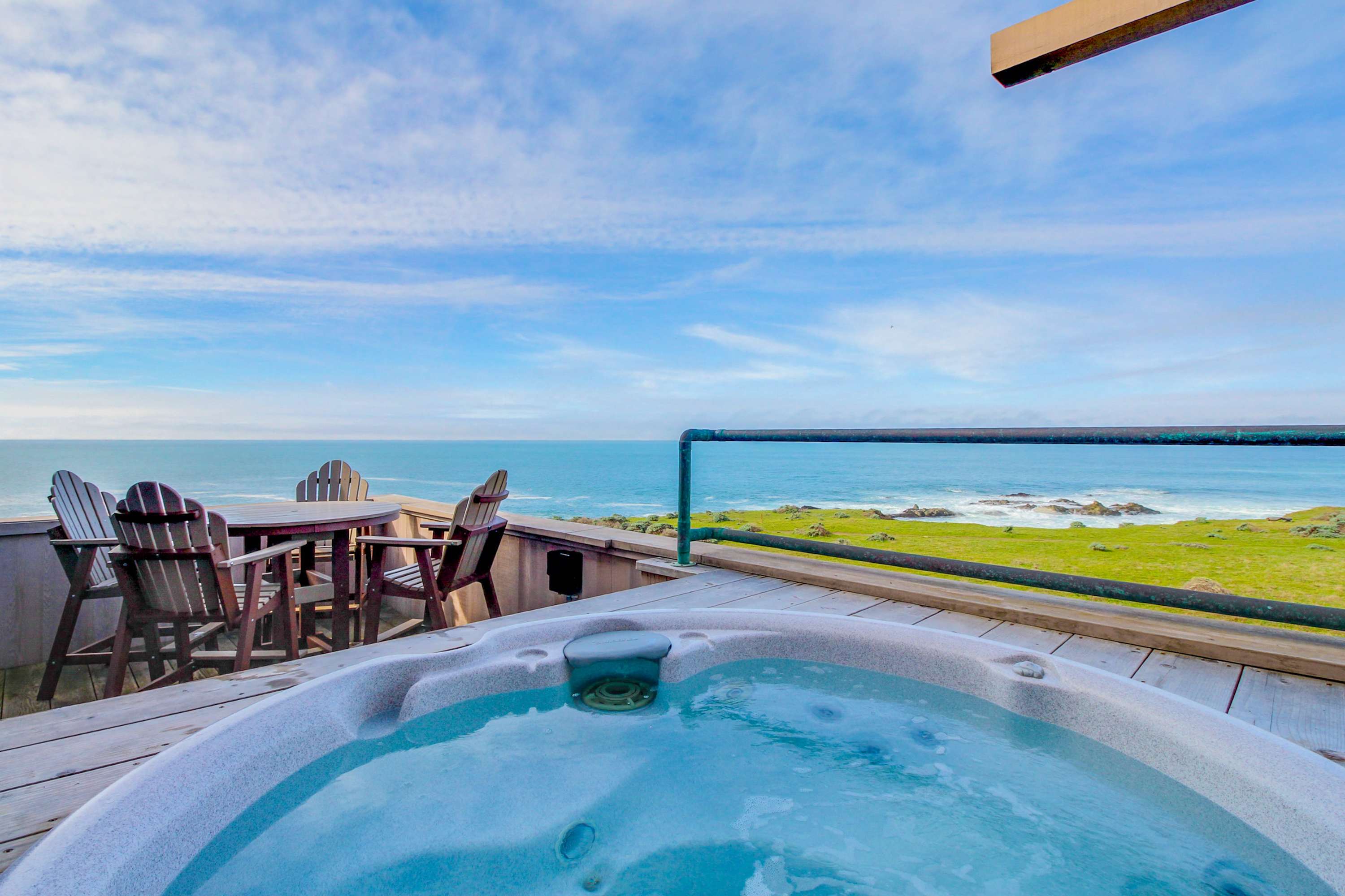 Soak in the private hot tub as you gaze at the endless ocean views—perfect for stargazing after sunset.