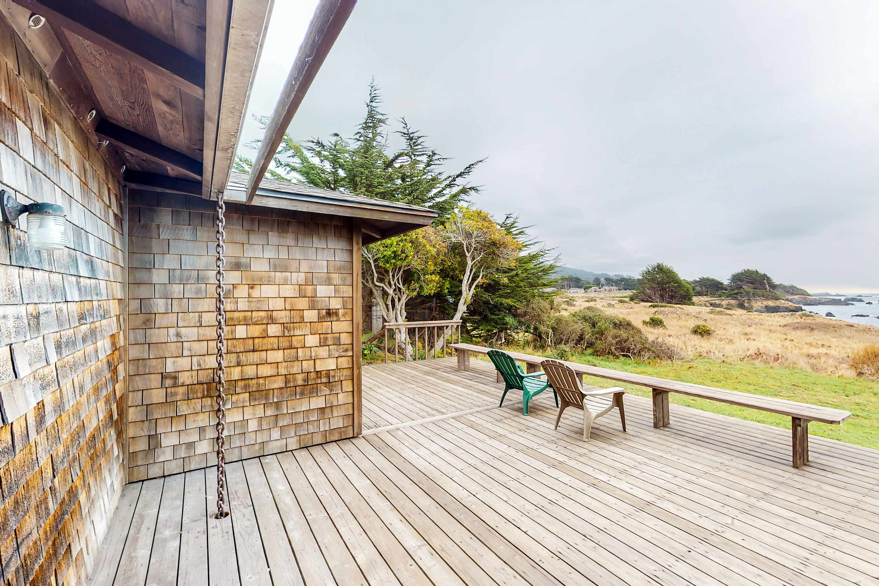 Step onto the expansive deck, where you can soak in the stunning coastal views while enjoying your morning coffee or evening wine.