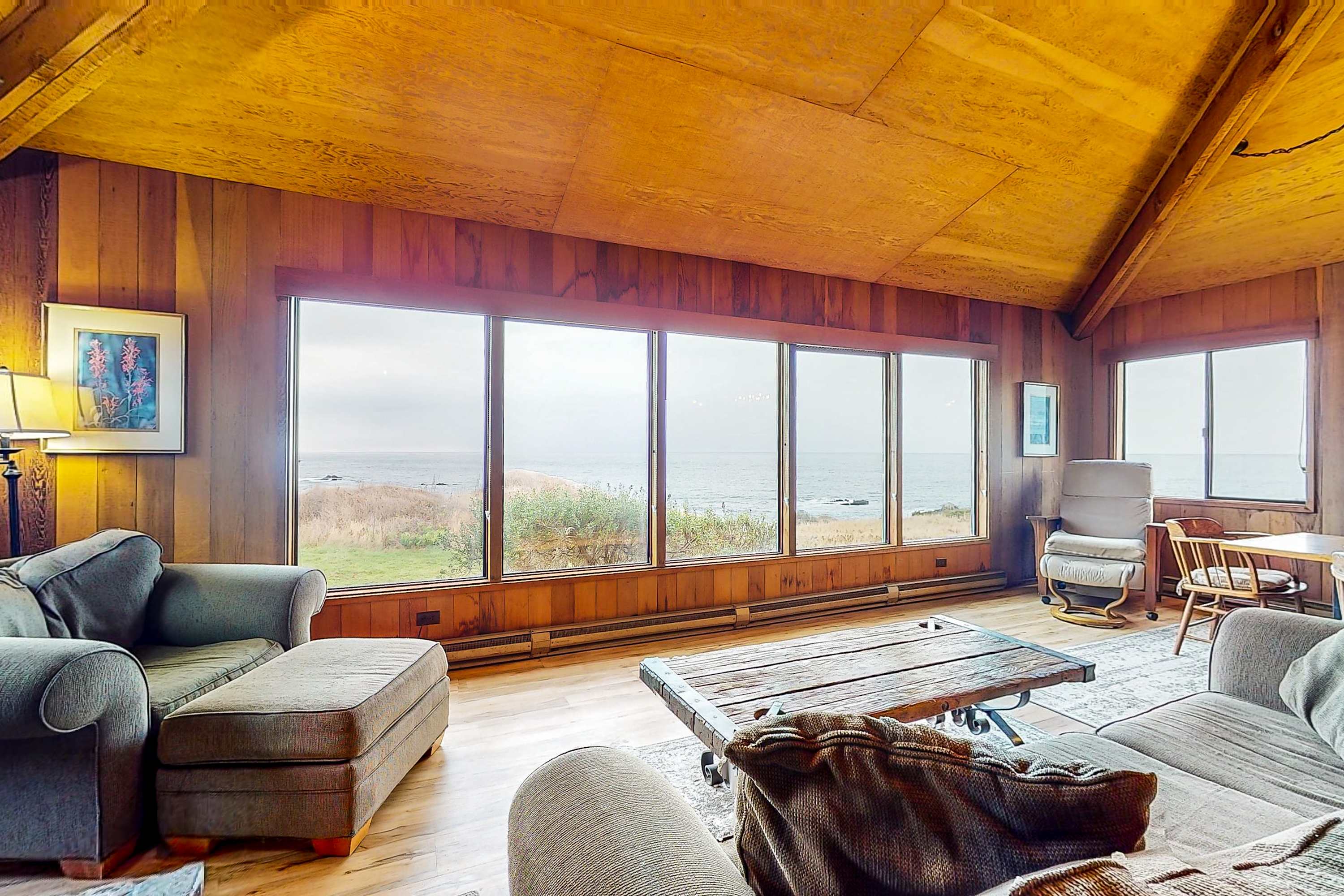 Imagine sipping your morning coffee here, with the gentle ocean waves just beyond the expansive windows.