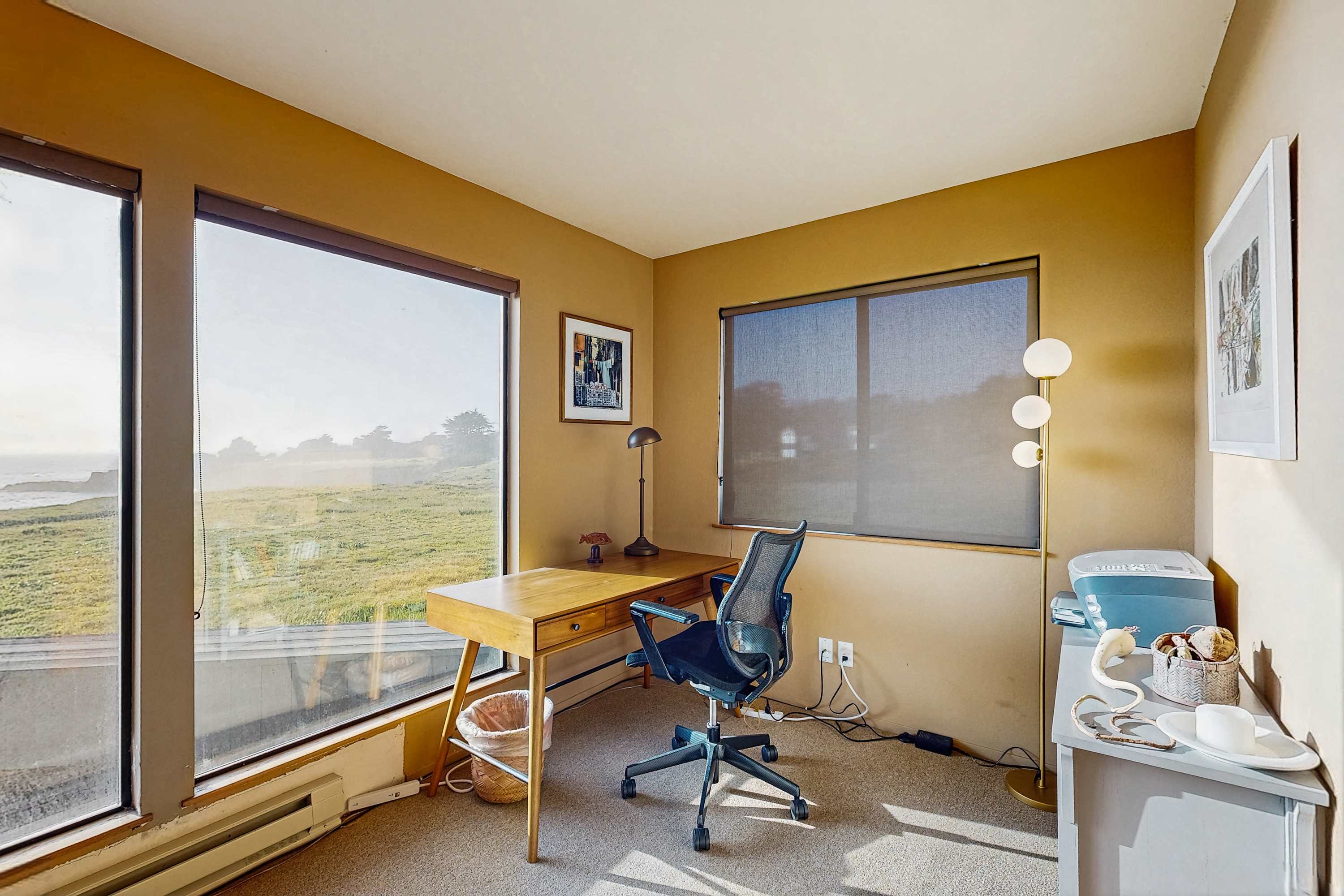 Find your inspiration in the cozy workspace, where stunning views and natural light create the perfect environment for productivity.