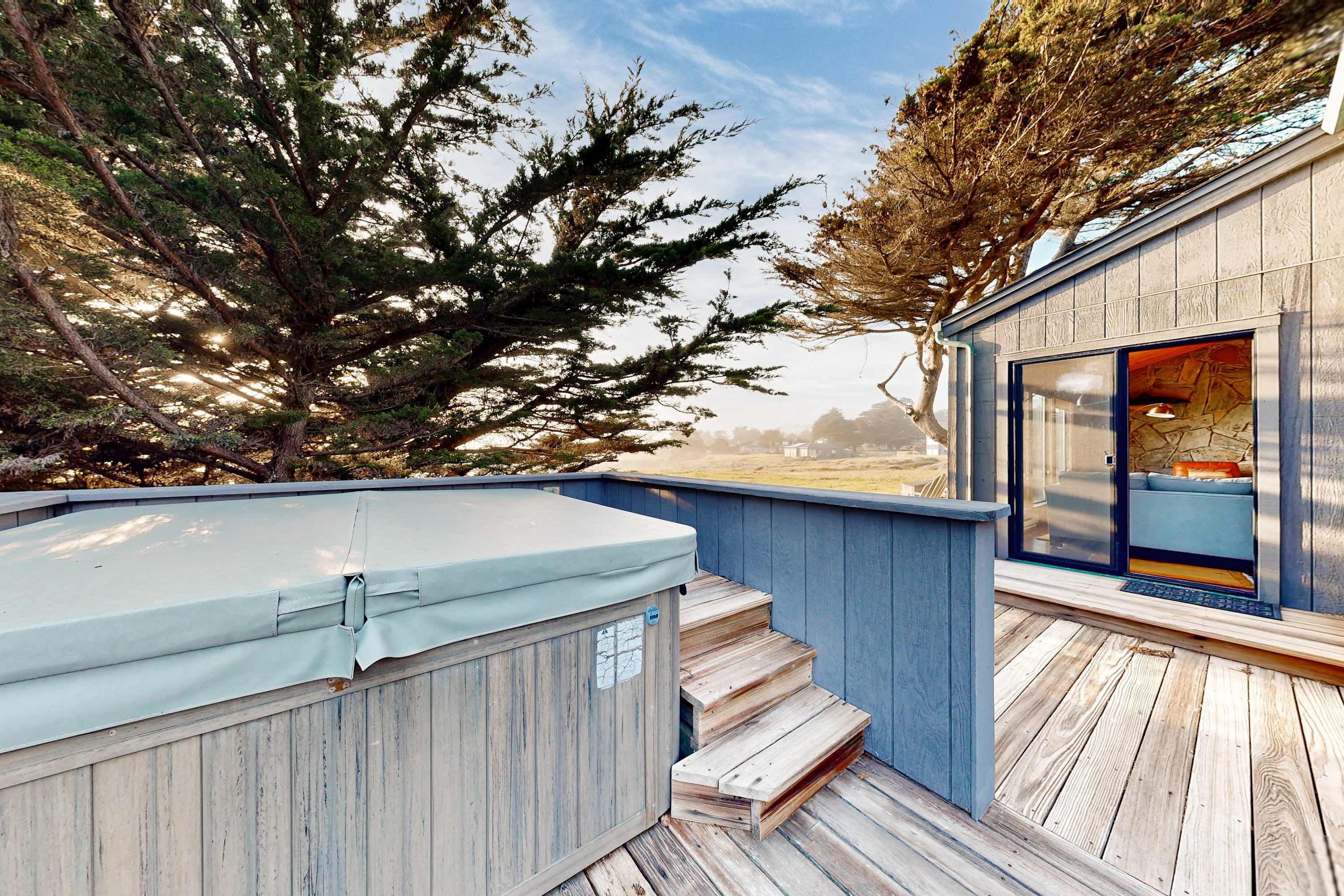 Slip into the soothing waters of your private hot tub, surrounded by the serene sounds of nature and the gentle ocean breeze.