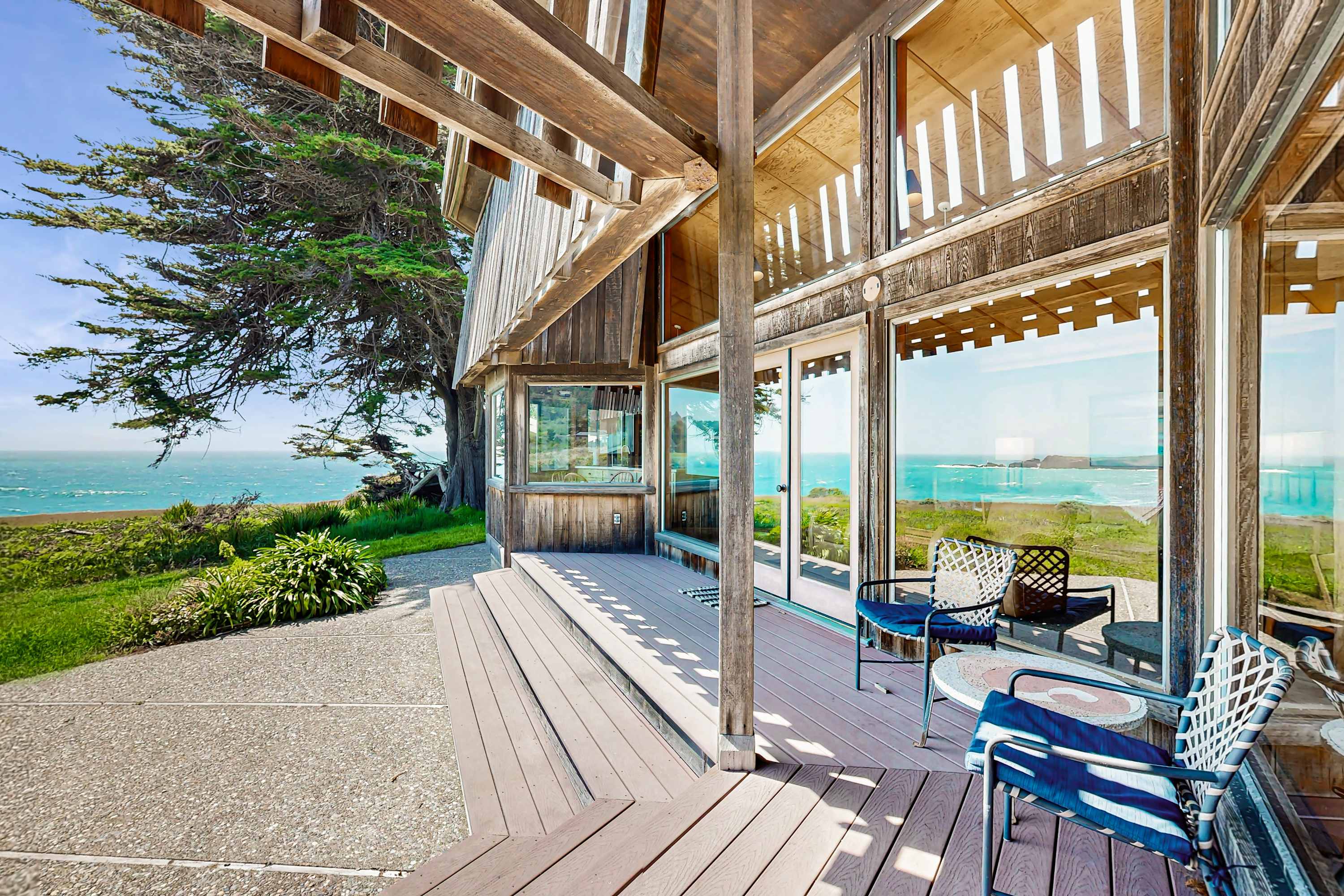 Step outside to the deck, a perfect spot for sunset watching and soaking in the stunning coastal panorama.